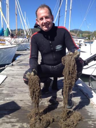 Dr Barrie Forrest with hull fouling seaweeds