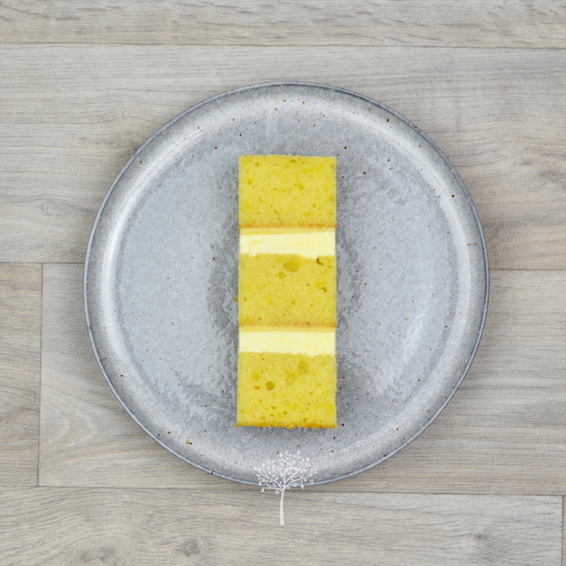 Passionfruit & Vanilla - Madagascan vanilla & Belgian white chocolate sponge with home made passionfruit curd & Madagascan vanilla buttercream