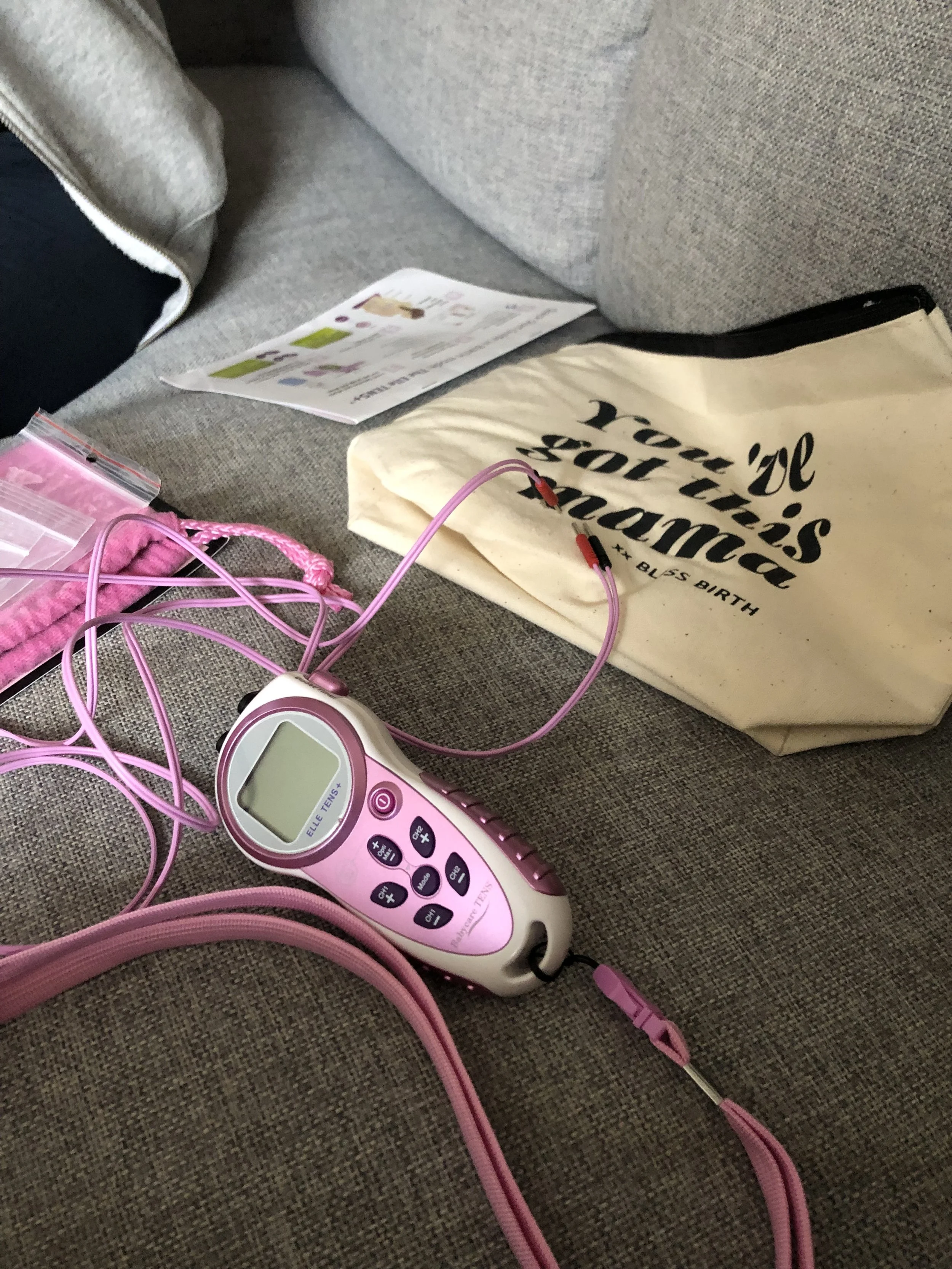 tans machine with wires, a storage bag and an instruction booklet