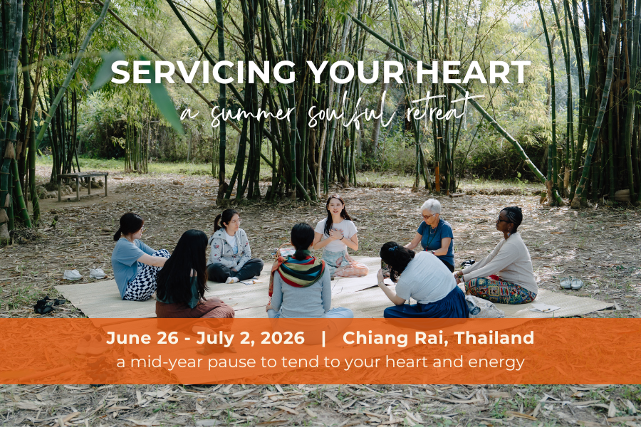 Youmin guiding forest therapy in a lush bamboo forest in Asia, Chiang Rai, Thailand.