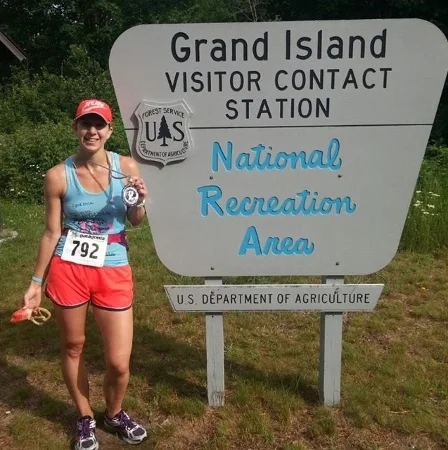 After the race with my hand blown glass medal. Still my favorite medal!