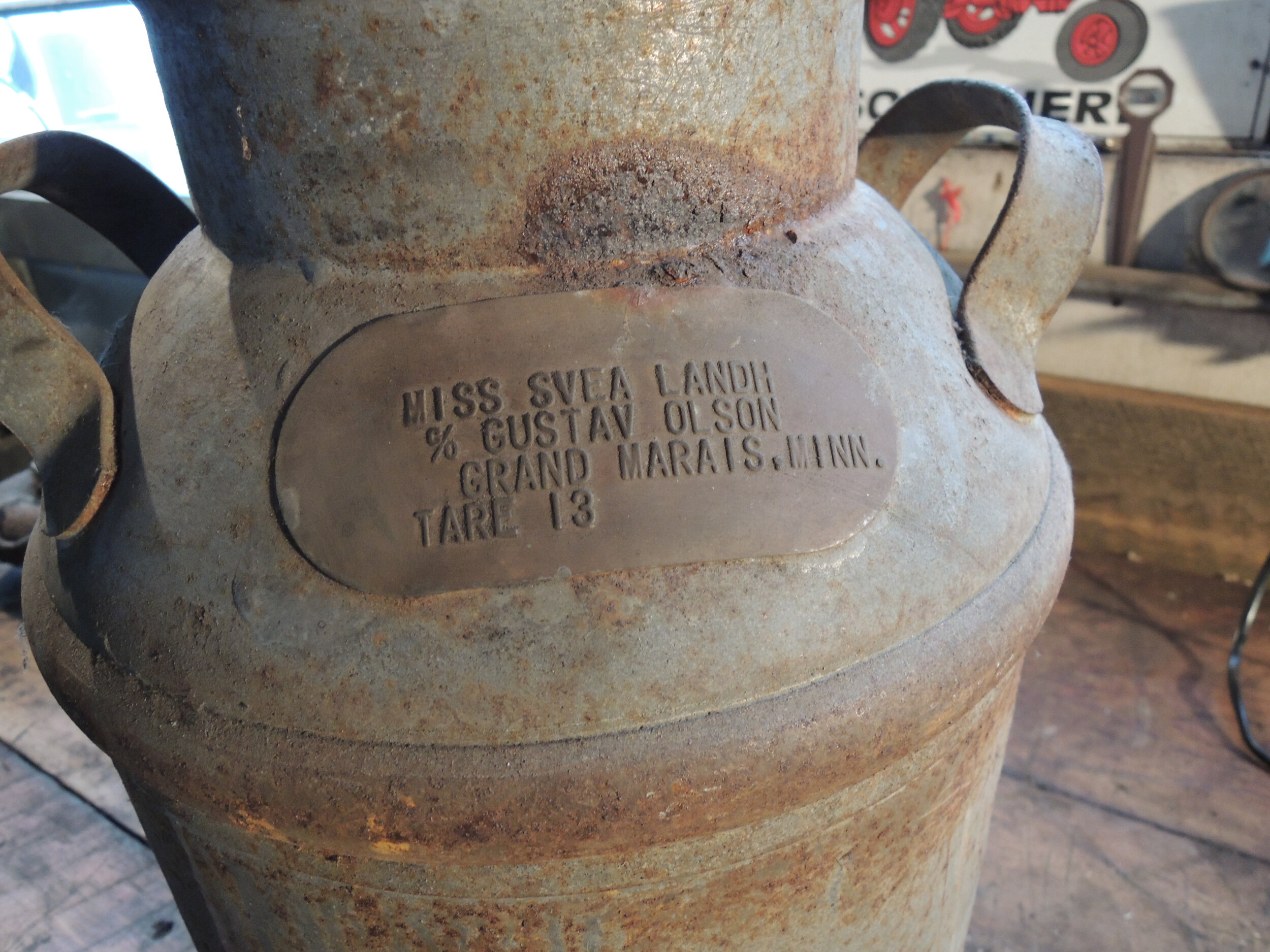 2014-019.0009 milk can plaque.jpg