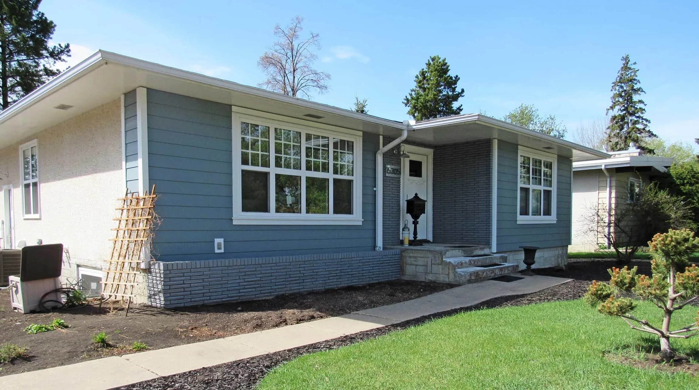 Siding: James Hardie Boothbay Blue Trim: James Hardie Arctic White