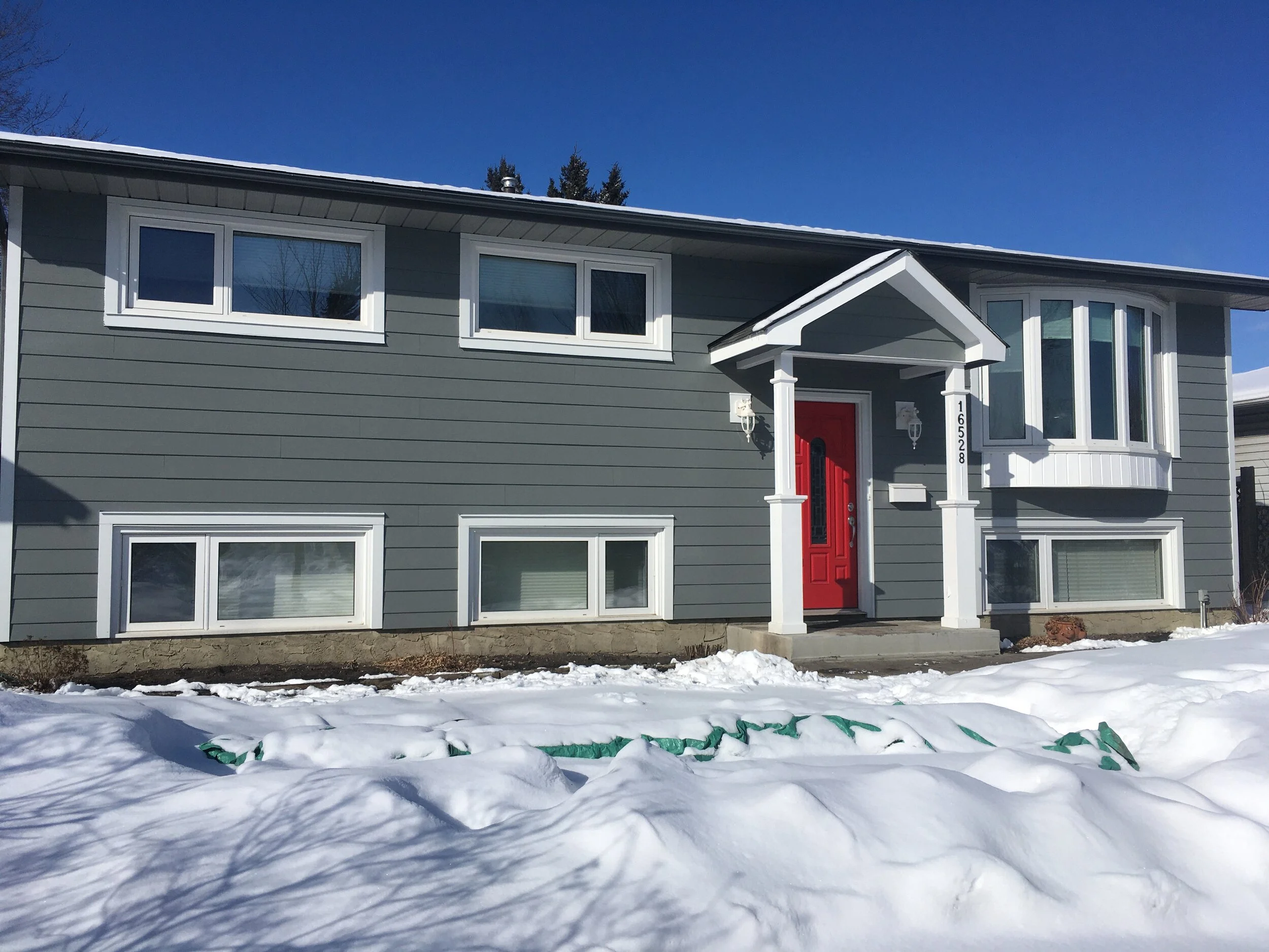 Covering Up Asbestos Stucco — Blue Jay Exterior Renovations