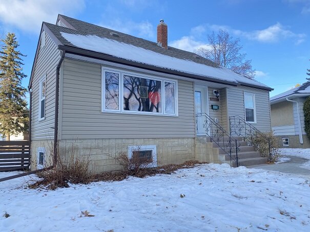 Vinyl Siding Dutchlap Over Stucco.jpg