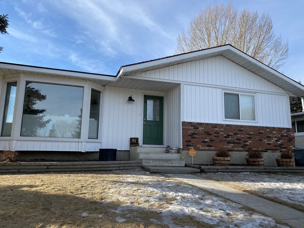 Viny Board and Batten Siding Renovation Sherwood Park Edmonton.jpg