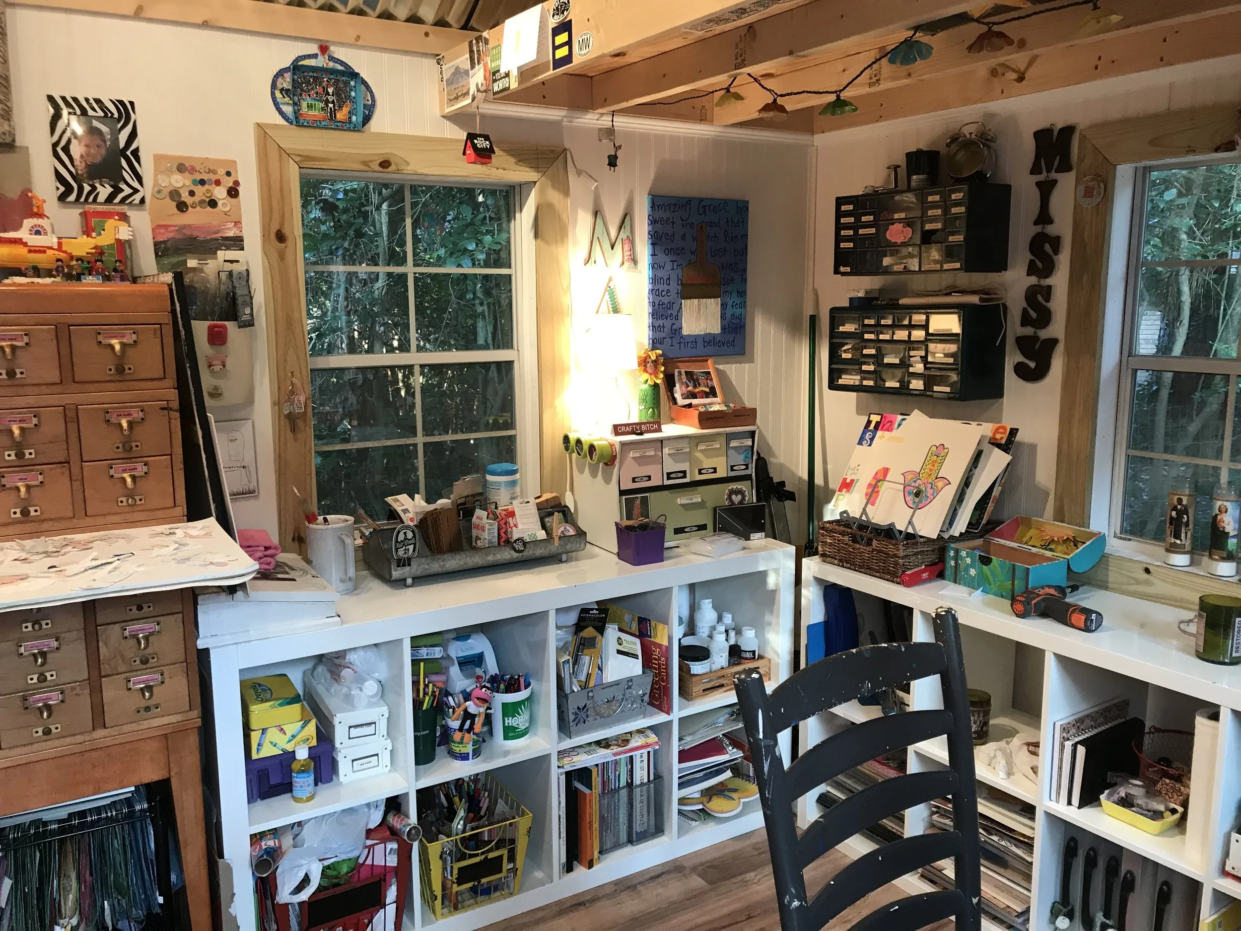 This shelf holds my ridiculous collection of paints, crayons, pens, markers and pencils - THREE cubbies worth! I could teach a kindergarten class! It’s also home to my books, magazines and random gessos, mediums, glues and stuff.
