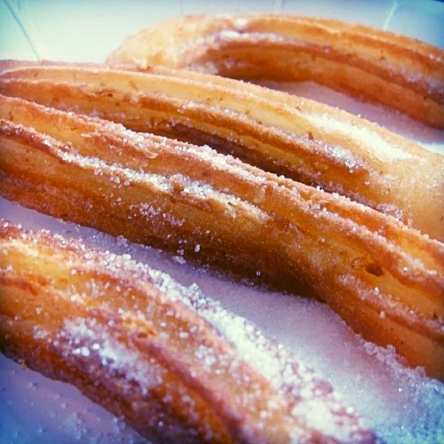 CHURROS & CHORIZO, SPANISH DELI MOBILE CATERER. Based in East Anglia. Facebook We've come across a lot of mobile caterers but the thing that stands out for us about Churros and Chorizo, is how unusual the menu is and the churros are to die for! Oh and suitable for vegans too with their warm vegan chocolate sauce! People get so excited by their lavish and yummy menu which offers authentic Spanish cuisine! Our band was salivating at the smell of the food cooking! On top of this, they are lovely, lovely people which we all know is super important when choosing wedding suppliers. These guys really contributed to the happiness of the wedding with their fun and friendly vibe.