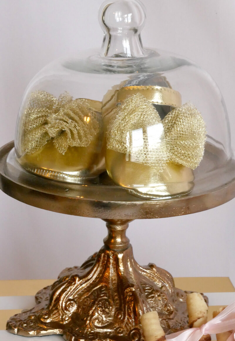 Cake stand with gold sparkly shoes