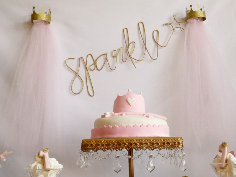 Adorable Princess party idea in pink and gold, with sparkle back drop