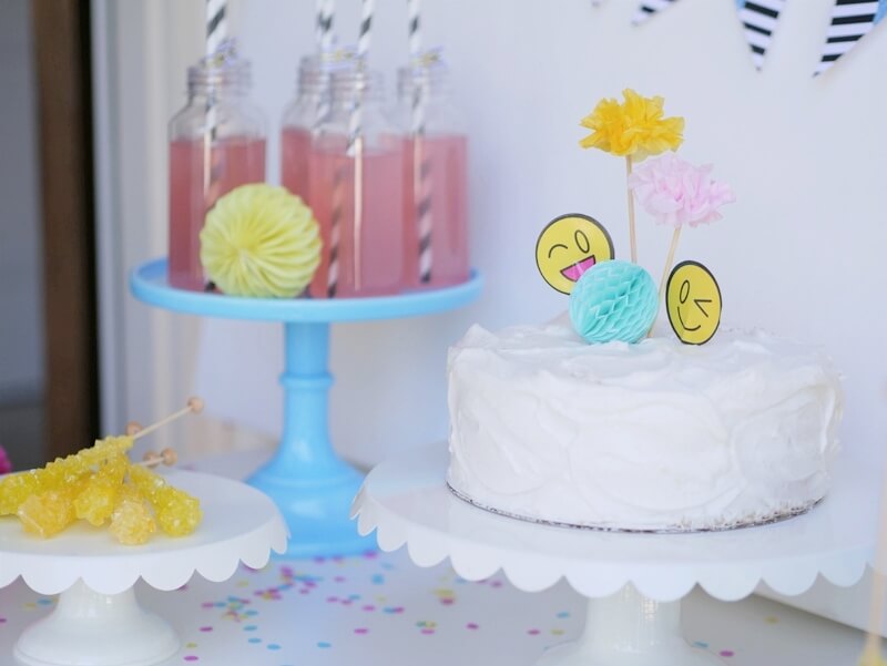 Emoji dessert table idea and a cute topper