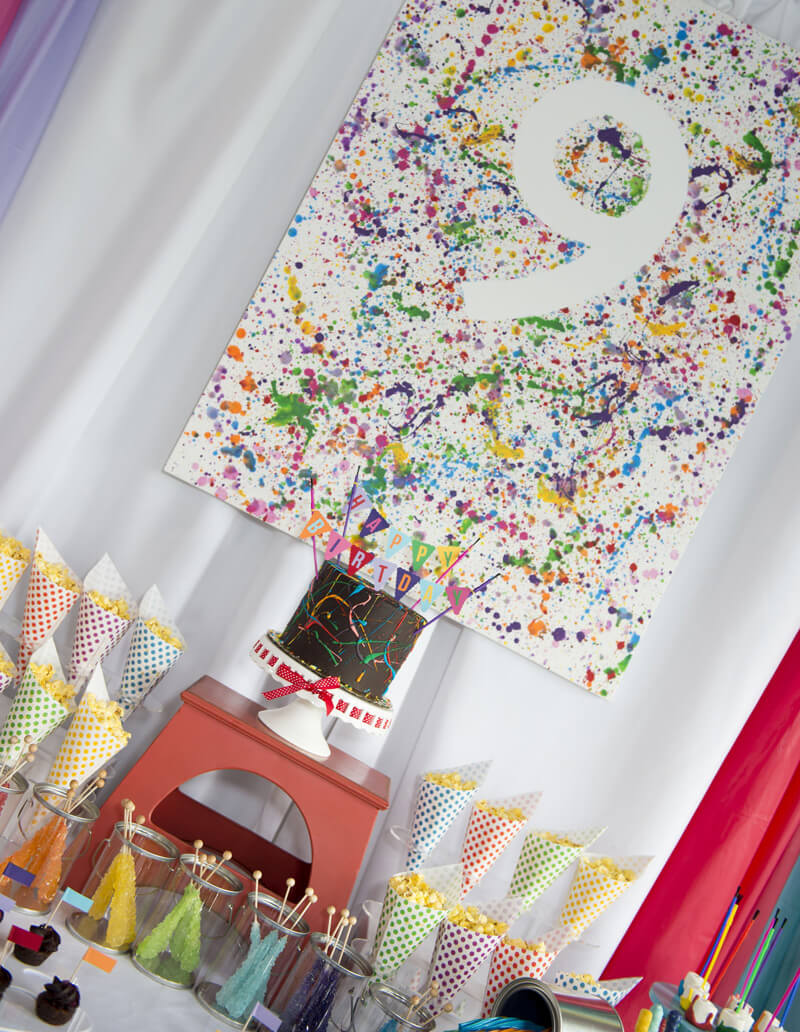 Colorful and fun welcome sign paint splatter