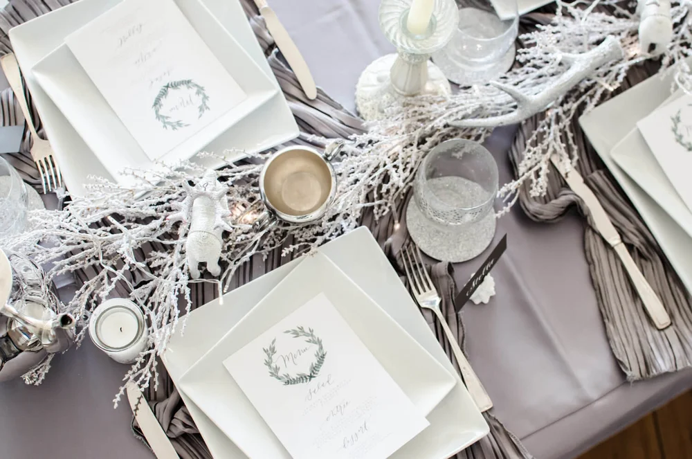 Engaging winter wonderland table setting A Winter Wonderland Bridal Shower Inspiration Mint Event Design