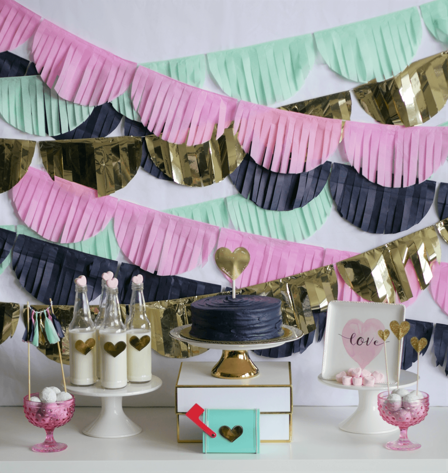 Valentines Day party idea / Valentines day dessert table / Valentines day party for kids / Valentines day dessert ideas / valentines day DIY / Valentines day party decor / Tissue paper backdrop idea / Styled by Carolina from MINT Event Design / www.minteventdesign.com