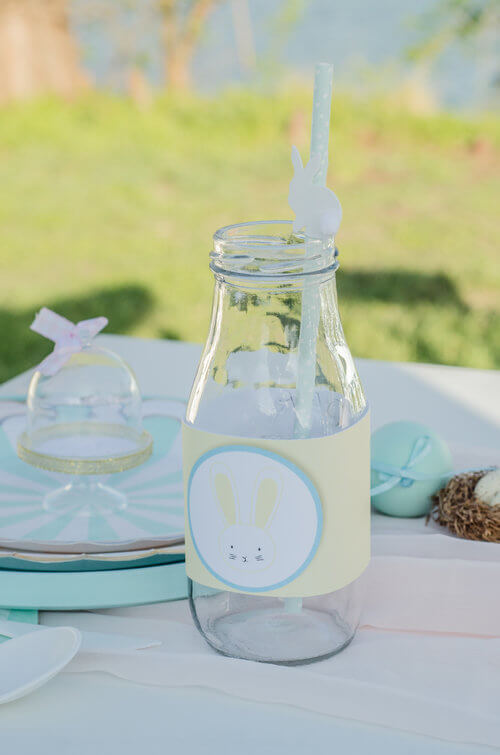  Cute bottle wrappers for the milk bottles add the perfect detail to this Easter Garden Party for Kids. The Easter wrappers are a free download from Mint Event Design www.minteventdesign.com #easterparty #gardenparty #partysupplies #tablescape #easte