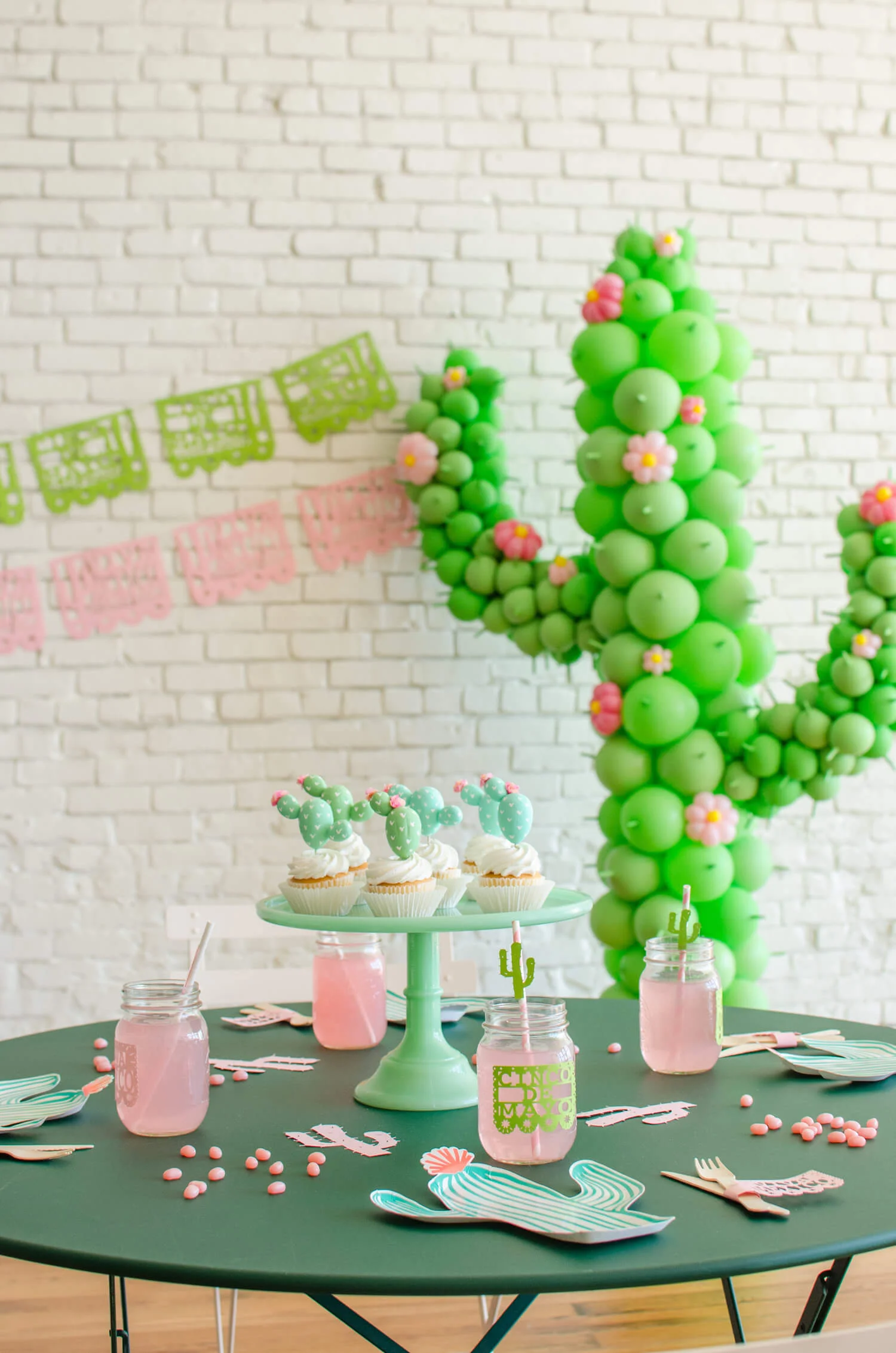 Cinco de Mayo party ideas / Cinco de Mayo party decor / Cinco de Mayo dessert ideas / Cinco de Mayo dessert table / Cactus Balloon Art / DiY Cactus cupcake toppers / Papel Picado decor / Cactus party Ideas / Sahuaro party ideas / Southwestern party ideas / Mint and Pink party ideas / Styled by Carolina from MINT Event Design / www.minteventdesign.com