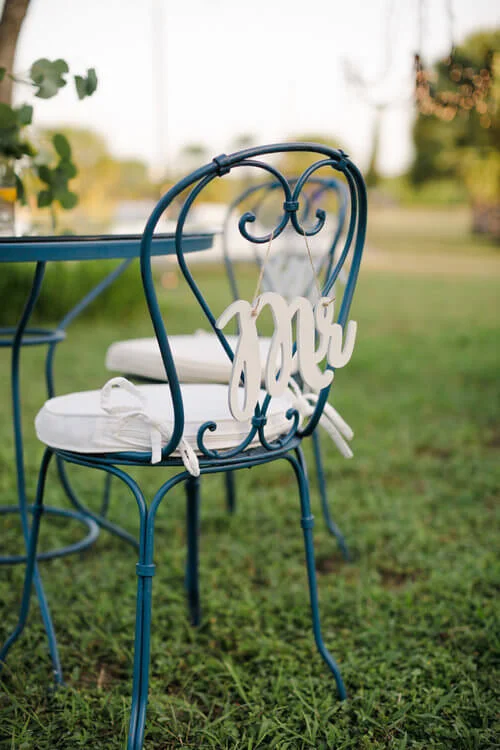 French country wedding inspiration with Mr chair sign.