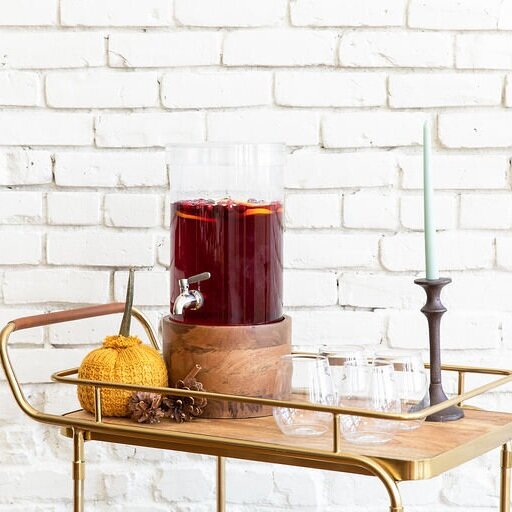 Cranberry Thanksgiving Bar Cart with drink dispenser. Get the details now at minteventdesign.com!