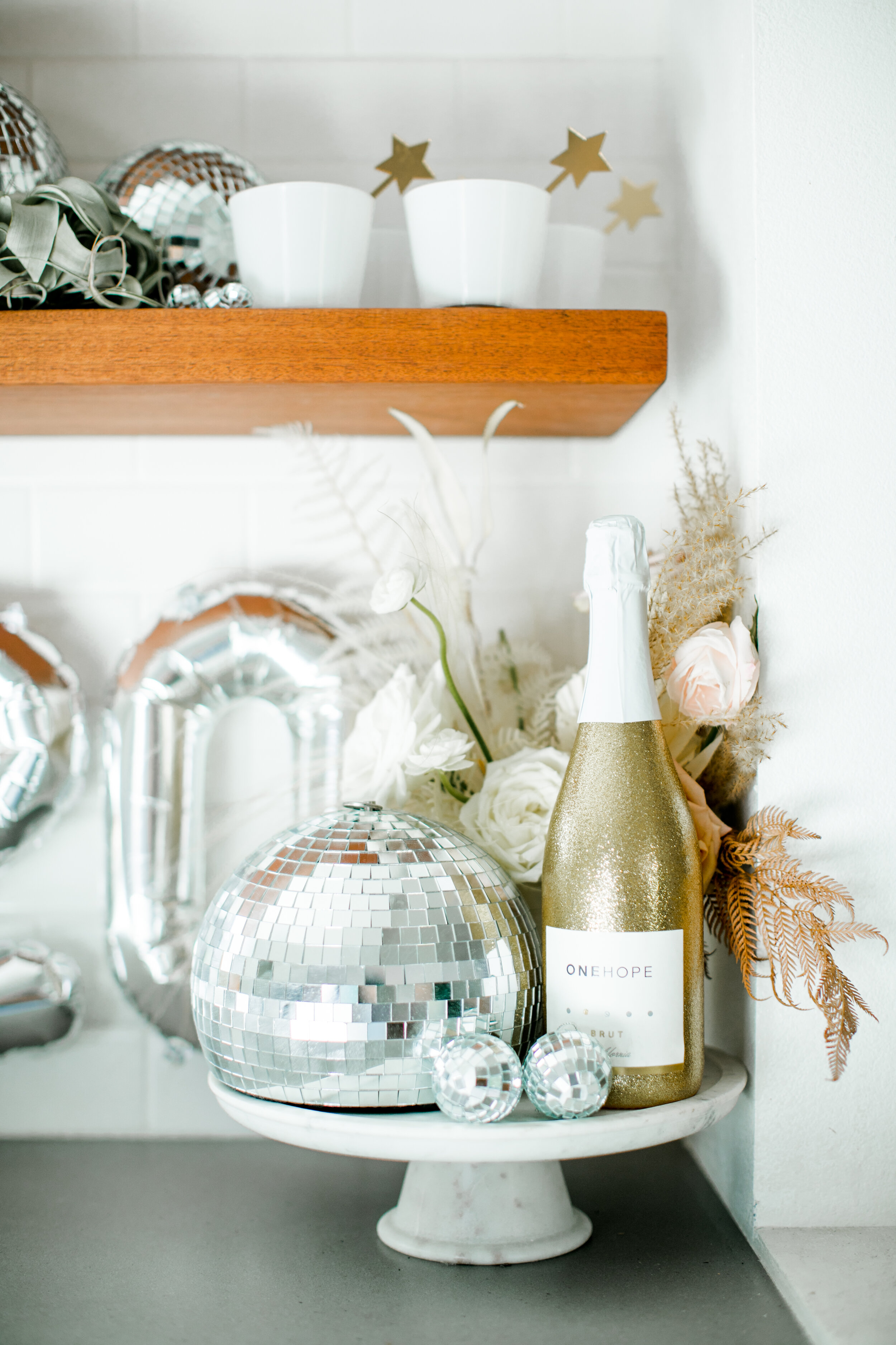 Mixed metallic NYE party inspiration - Champagne Bar - Get more New Year’s Eve decor ideas now at minteventdesign.com!