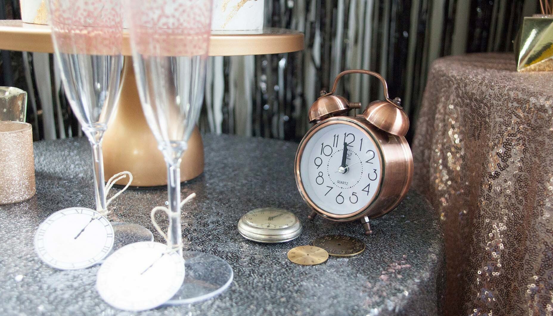 Mixed metallic NYE party inspiration - Vintage Time Pieces - Get more New Year’s Eve decor ideas now at minteventdesign.com!