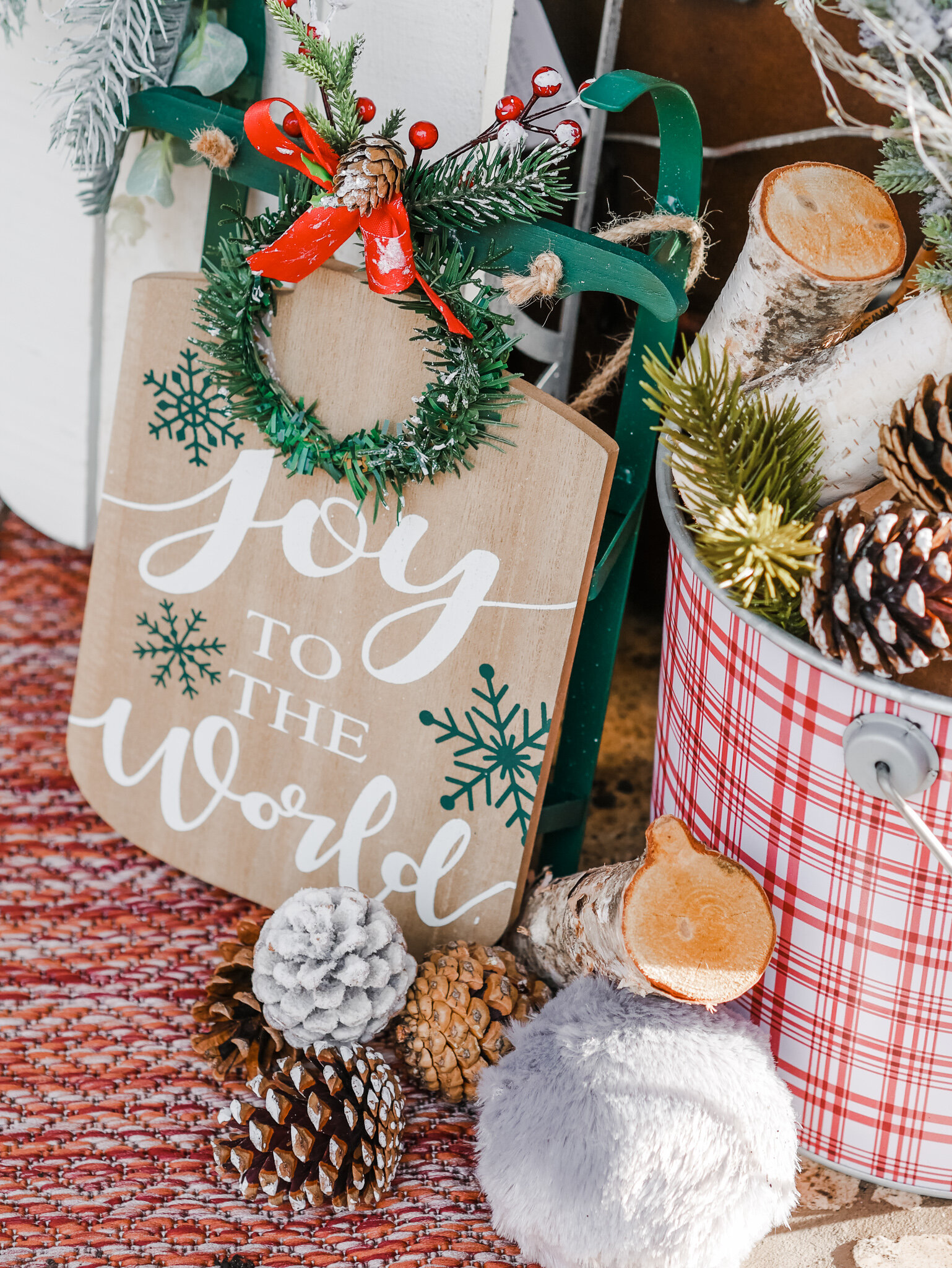 A modern farmhouse style Christmas porch designed by MINT Event Design in Austin, TX. Get more details and holiday decor ideas now at minteventdesign.com!