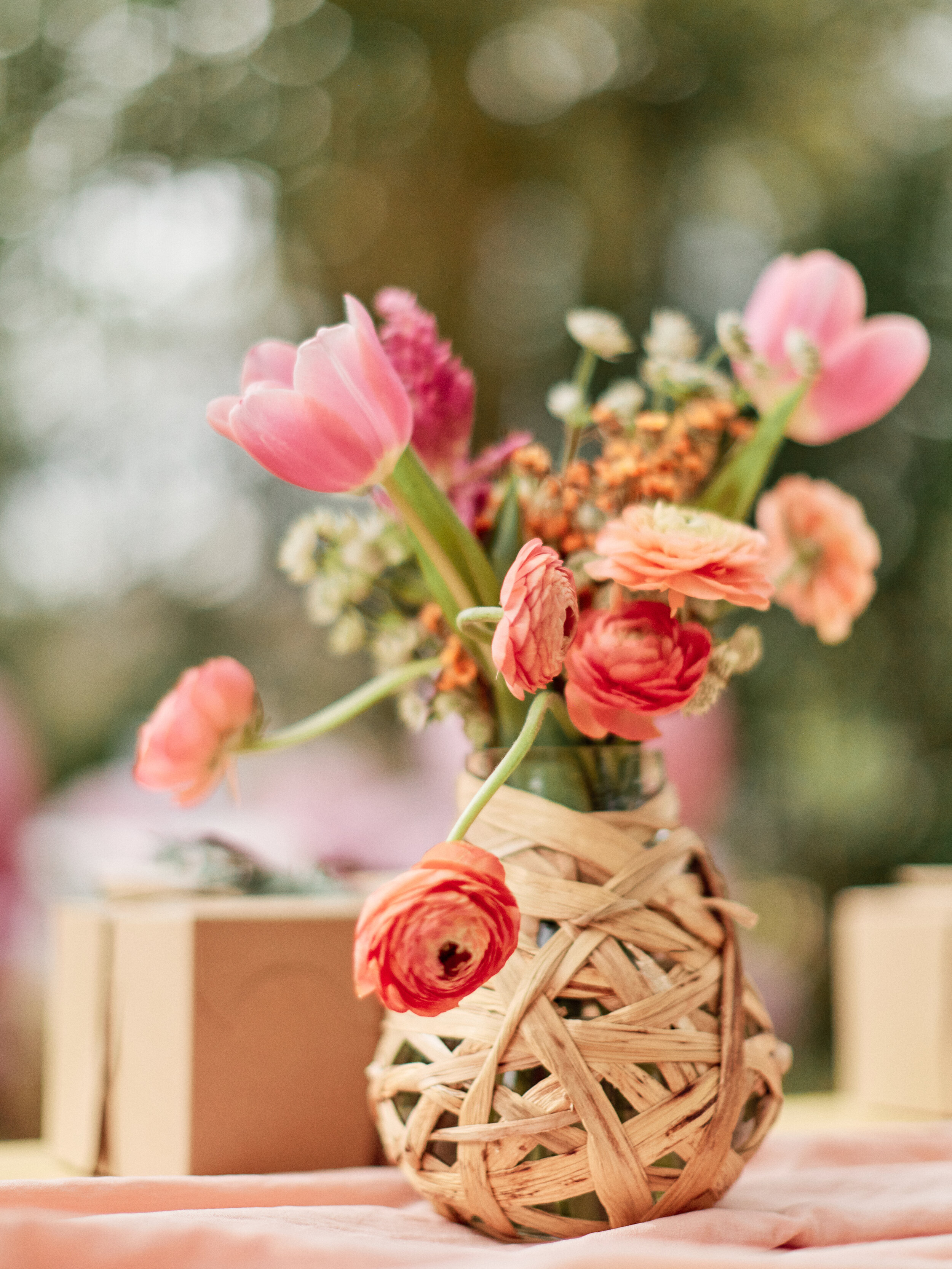 Floral arrangement in natural vase for a picnic party - get details and more party inspiration now at minteventdesign.com!