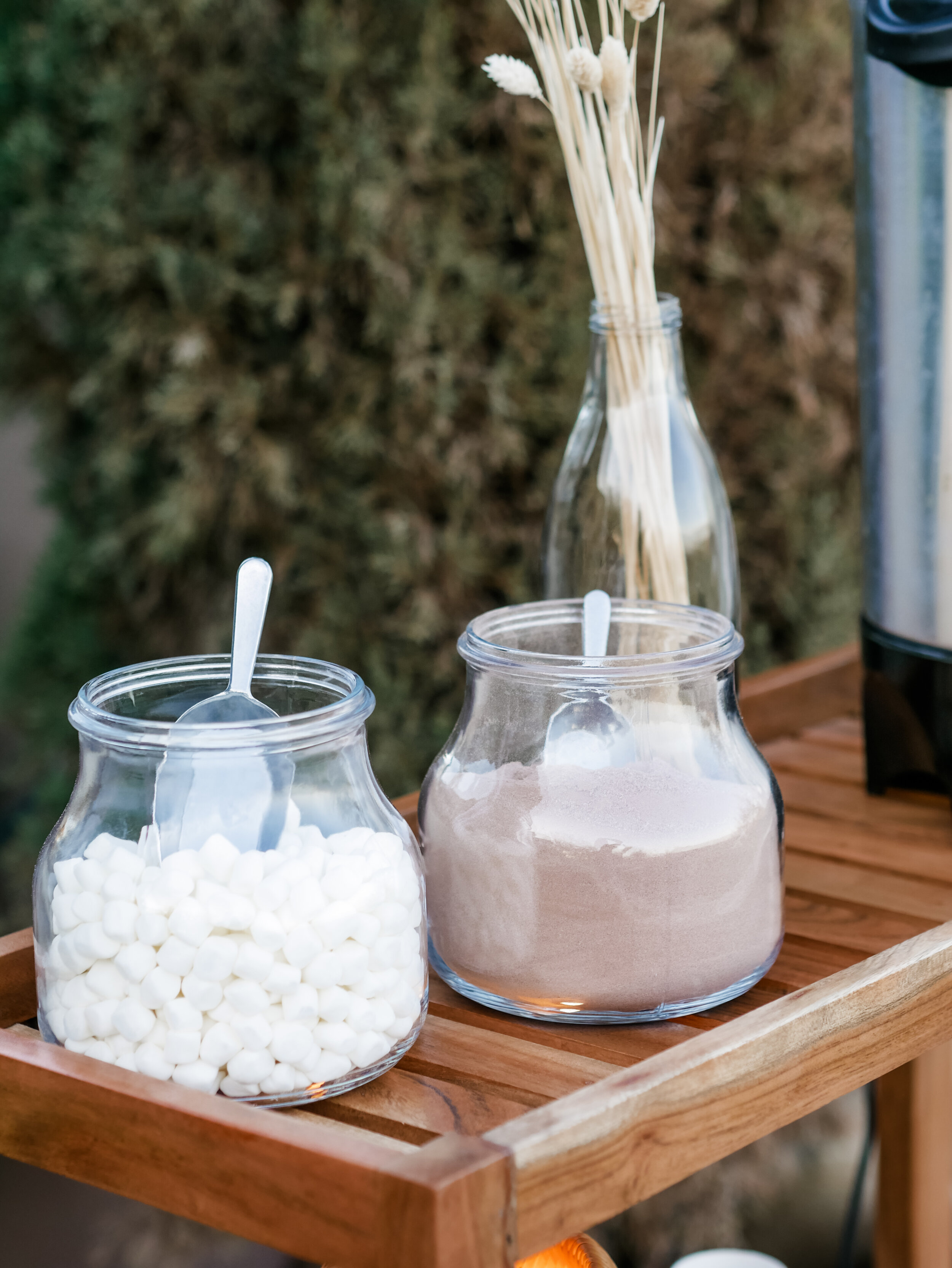  Hot cocoa station for a luxury backyard Glamping experience - with large rentable tent and picnic area from MINT Event Design in Austin, TX! Perfect for teen slumber parties, birthday parties, or bachelorette parties. See how event designer Carolina