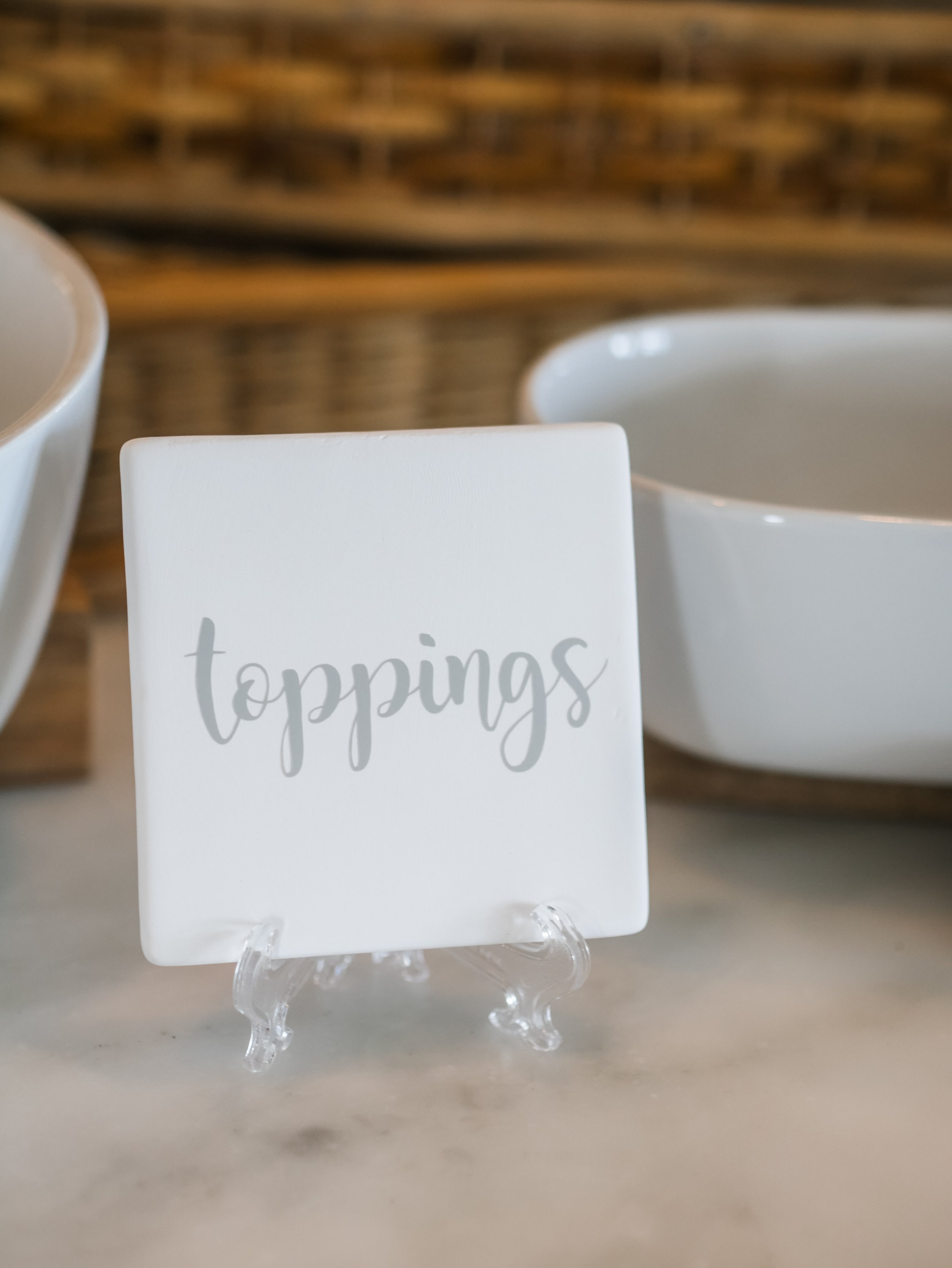 Elegant food labels using tiles - Host a stylish and relaxed Tulum beach-inspired Baby Shower with these ideas for food bar, drink station, picnic style seating, decor and more from event designer Carolina of MINT Event Design in Austin, Texas. Get 