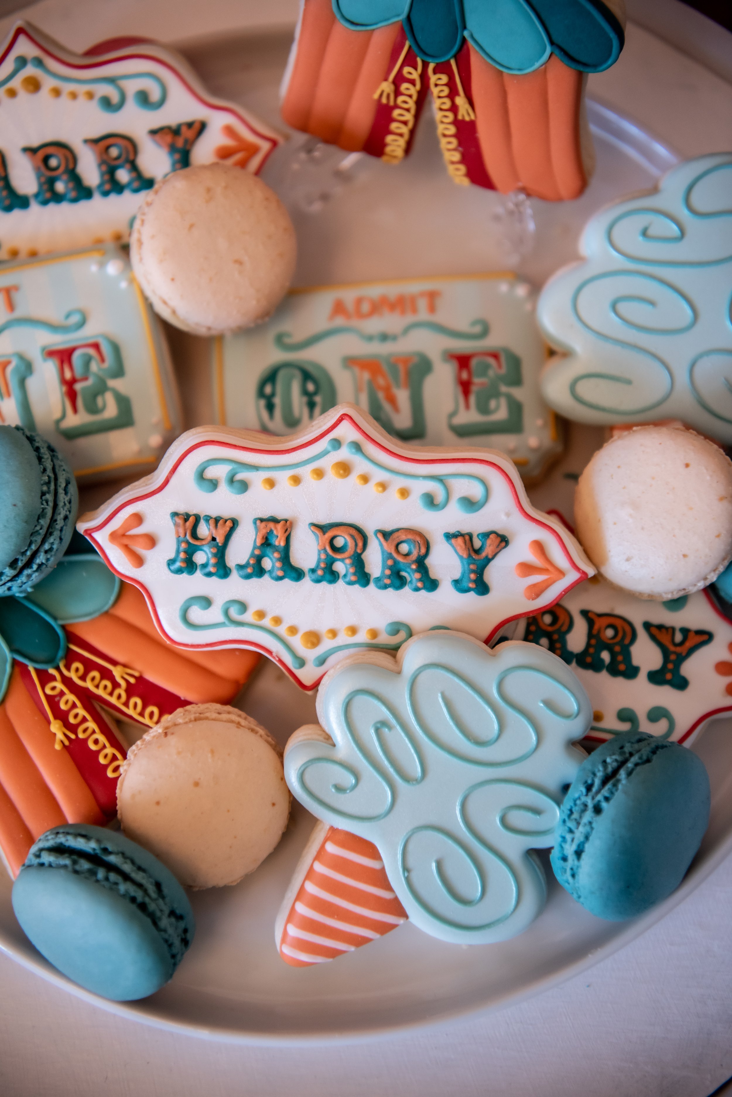 Carnival or circus themed birthday cookies and macarons. Party details at www.minteventdesign.com!