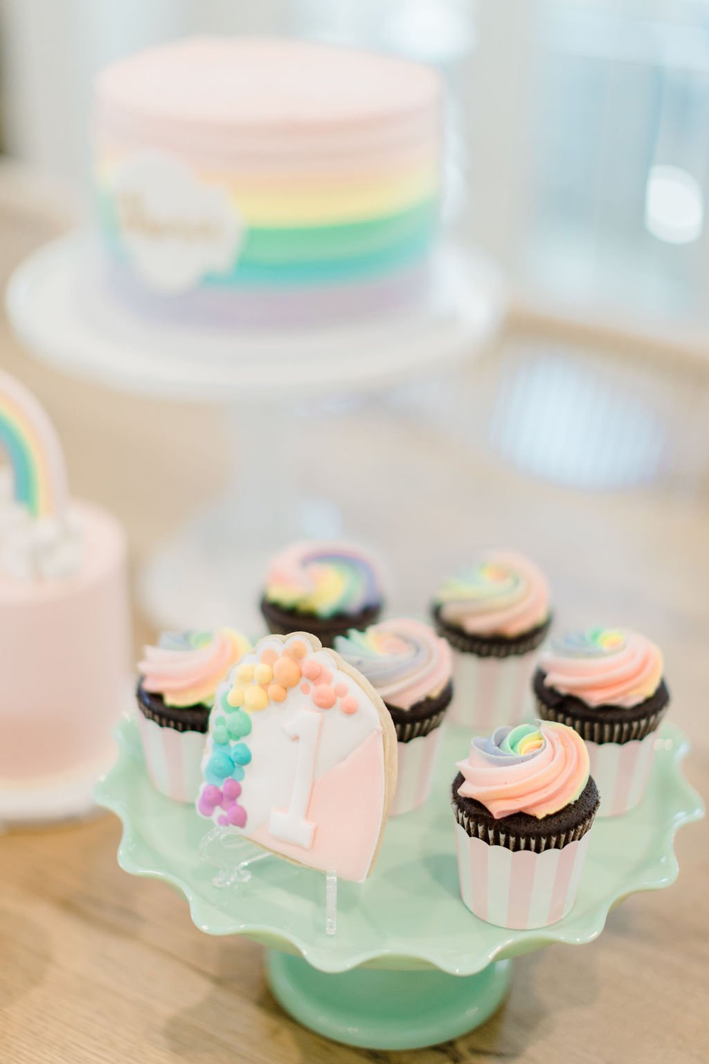 Rainbow First Birthday Dessert Table  - get details and more Rainbow Party inspiration at www.minteventdesign.com!