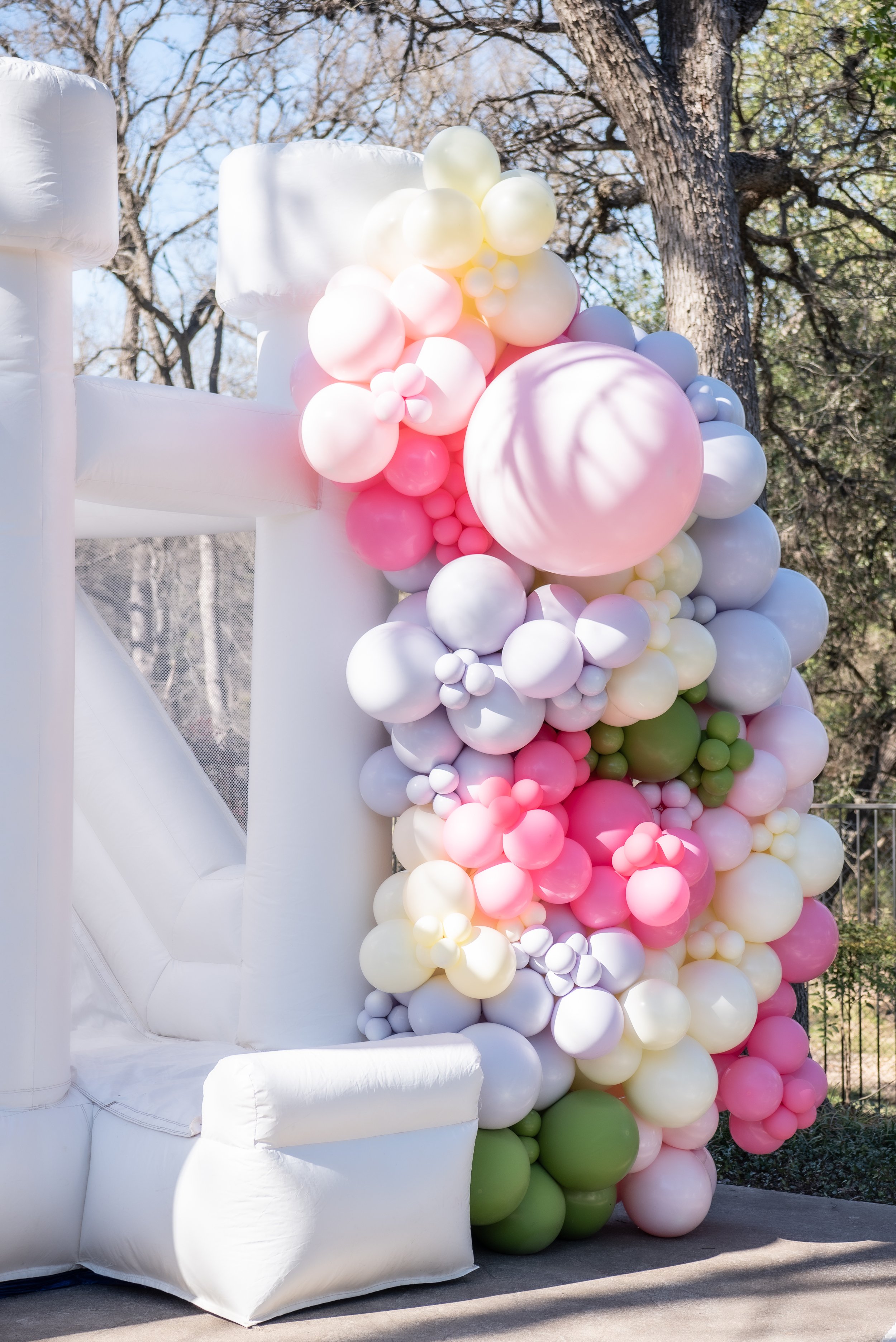 Bounce house setup for a pony-themed first birthday party. Get details from event designer Carolina of MINT Event Design in Austin, TX at www.minteventdesign.com!