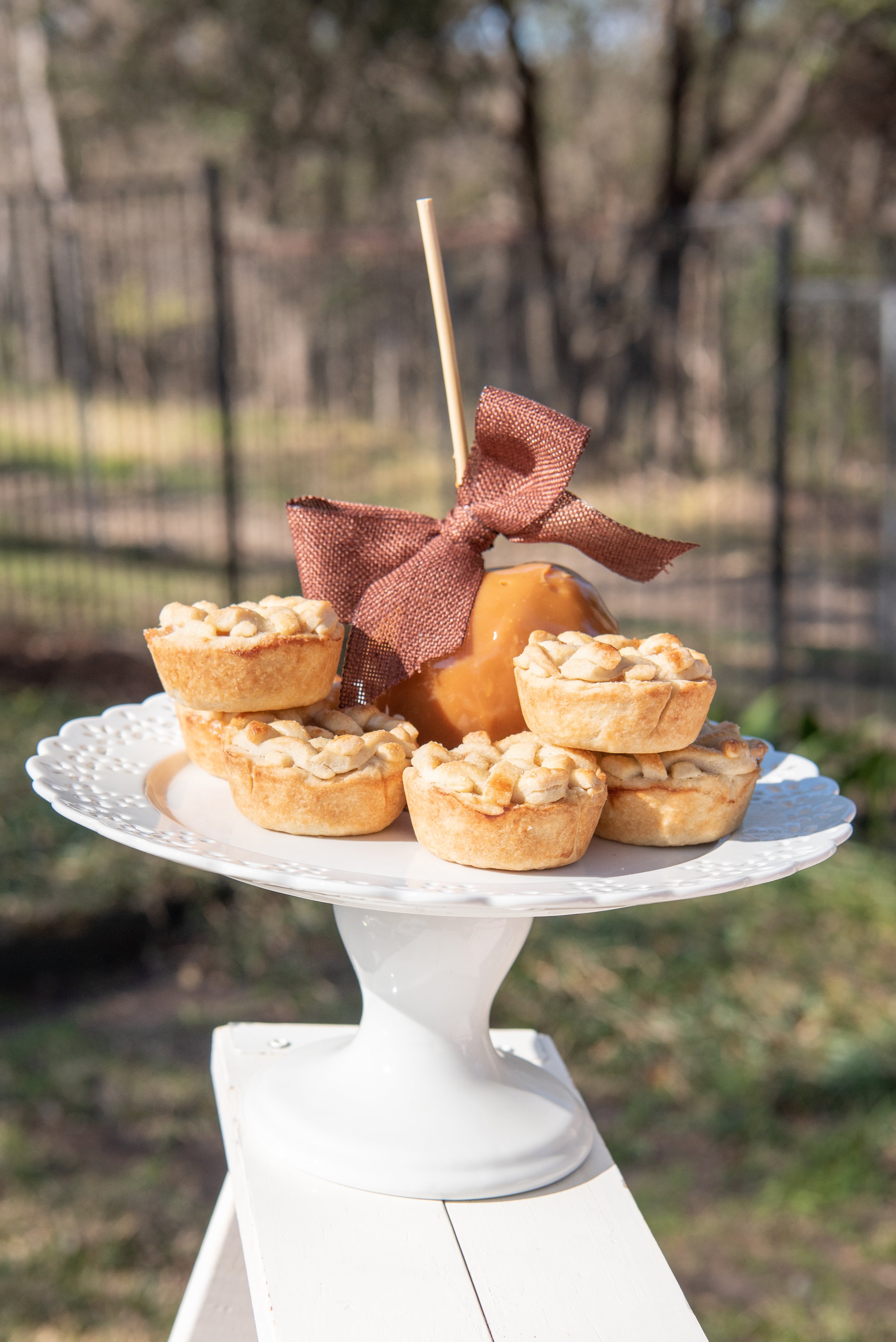 Sweet treats set up on a rustic ladder for a pony-themed first birthday party. Get details from event designer Carolina of MINT Event Design in Austin, TX at www.minteventdesign.com!