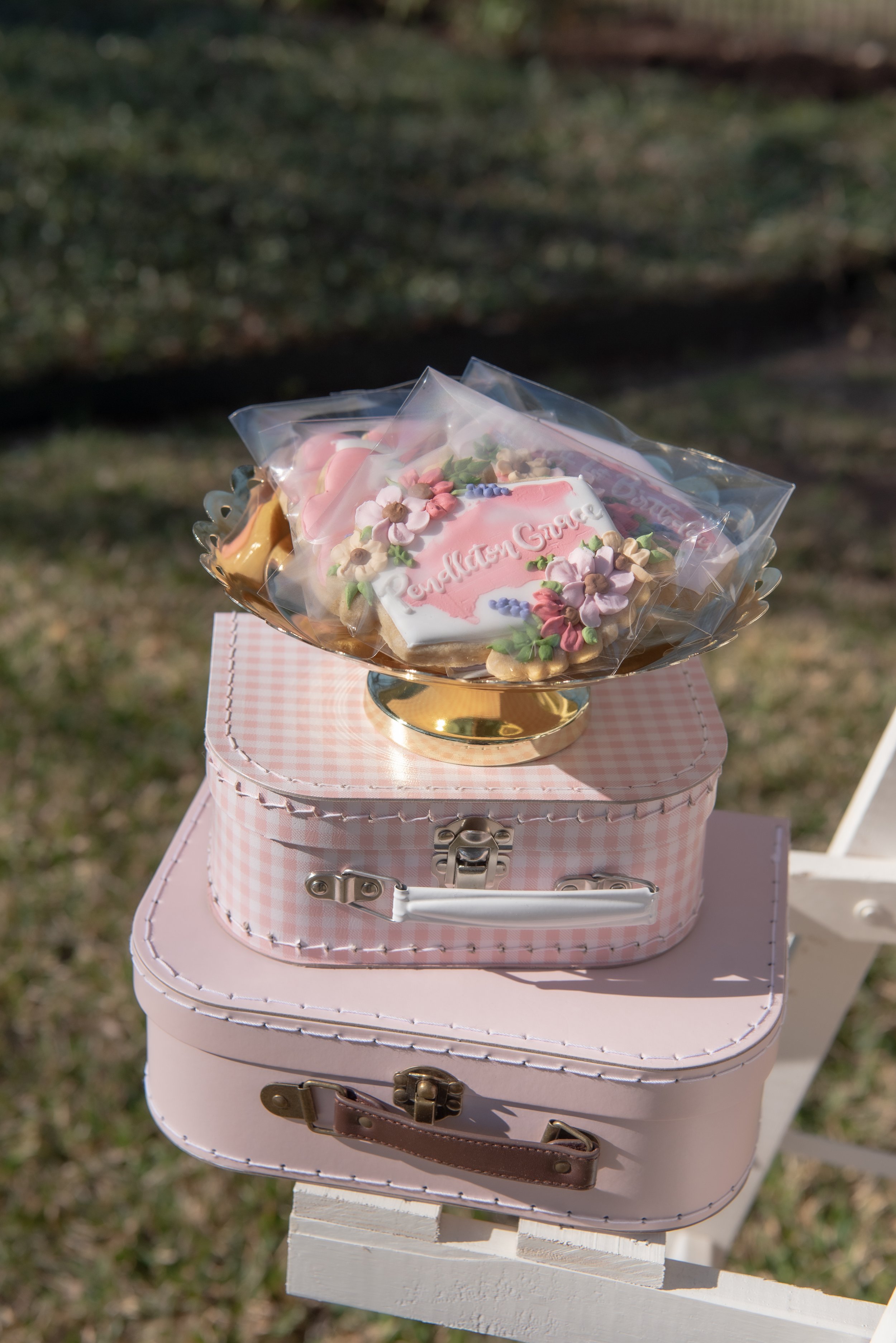 Sweet treats set up on a rustic ladder for a pony-themed first birthday party. Get details from event designer Carolina of MINT Event Design in Austin, TX at www.minteventdesign.com!