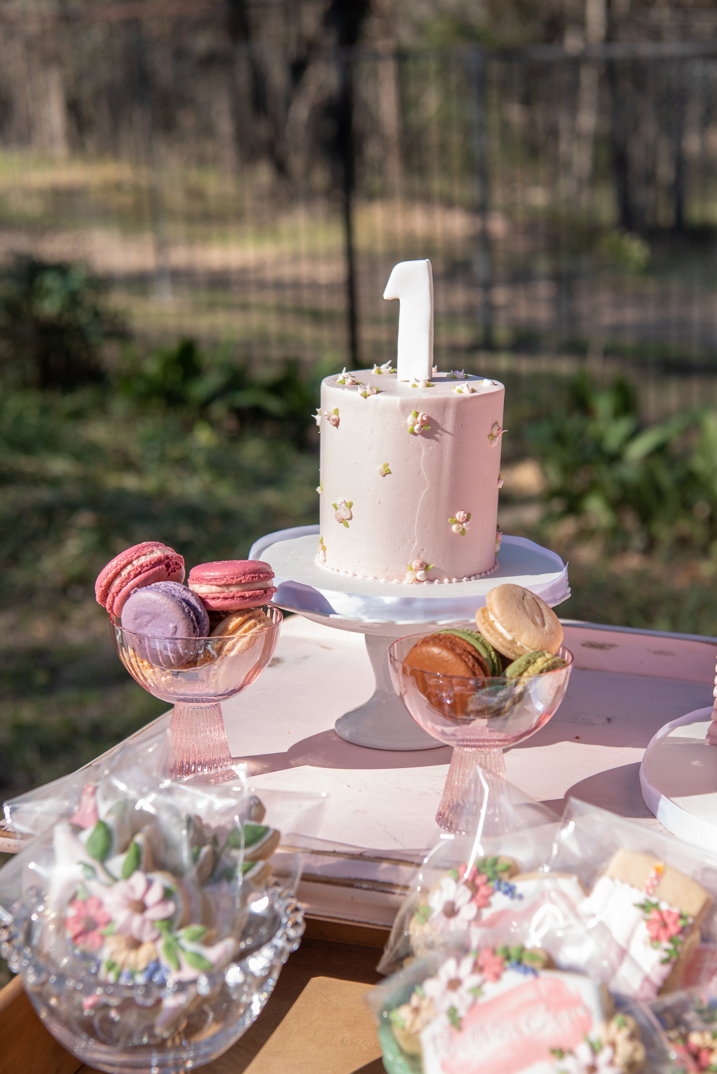 Sweet treats set up on a rustic dresser for a pony-themed first birthday party. Get details from event designer Carolina of MINT Event Design in Austin, TX at www.minteventdesign.com!