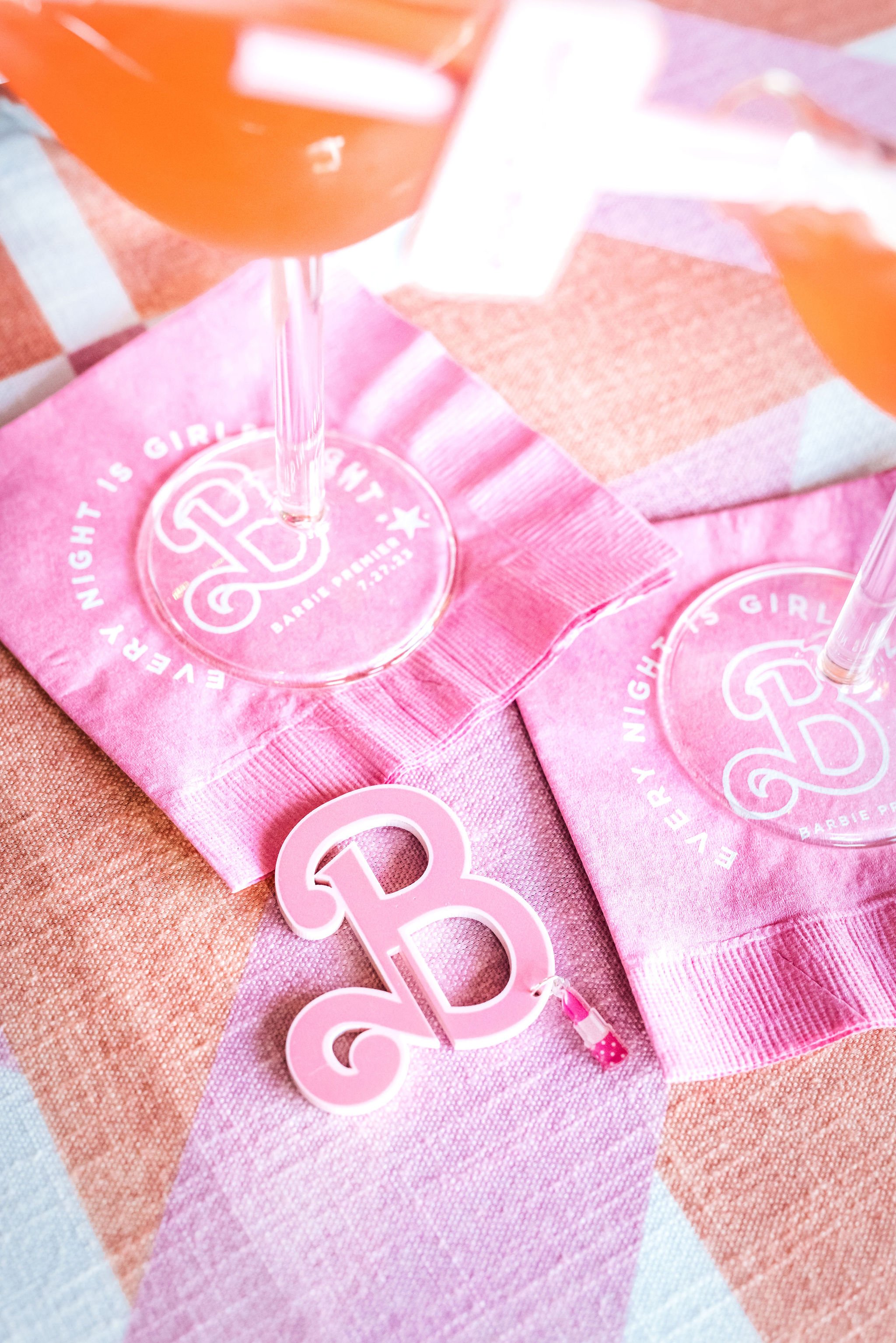 Customized Barbie Party cocktail napkins and favors. Get more ideas for a Barbie Movie Party at www.minteventdesign.com!