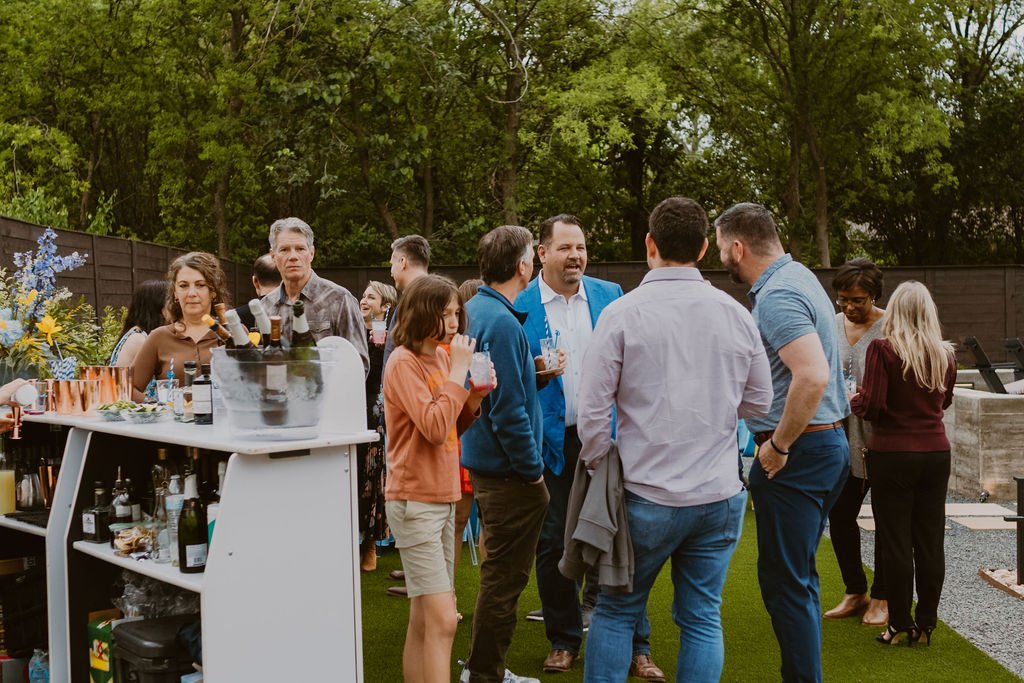 Drinks at an elegant backyard 50th Birthday Surprise Party. Get more ideas from event designer Carolina of MINT Event Design in Austin, TX at www.minteventdesign.com!