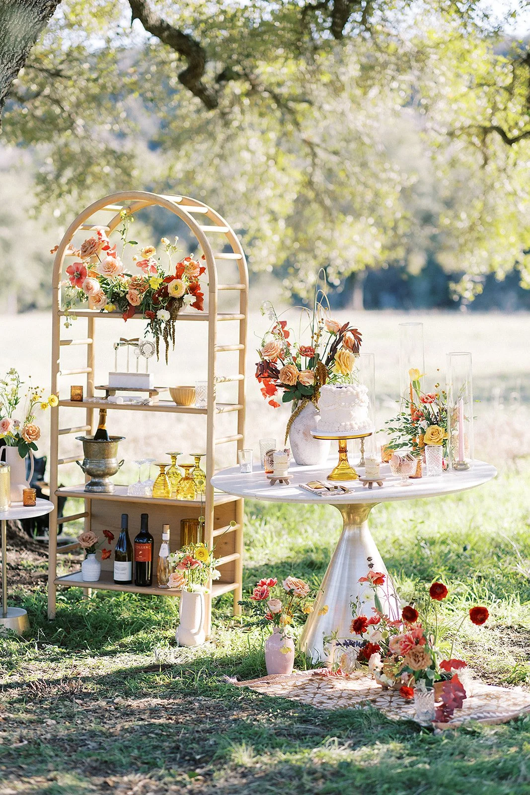Outdoor dessert and floral display designed by Austin event planner Mint Events