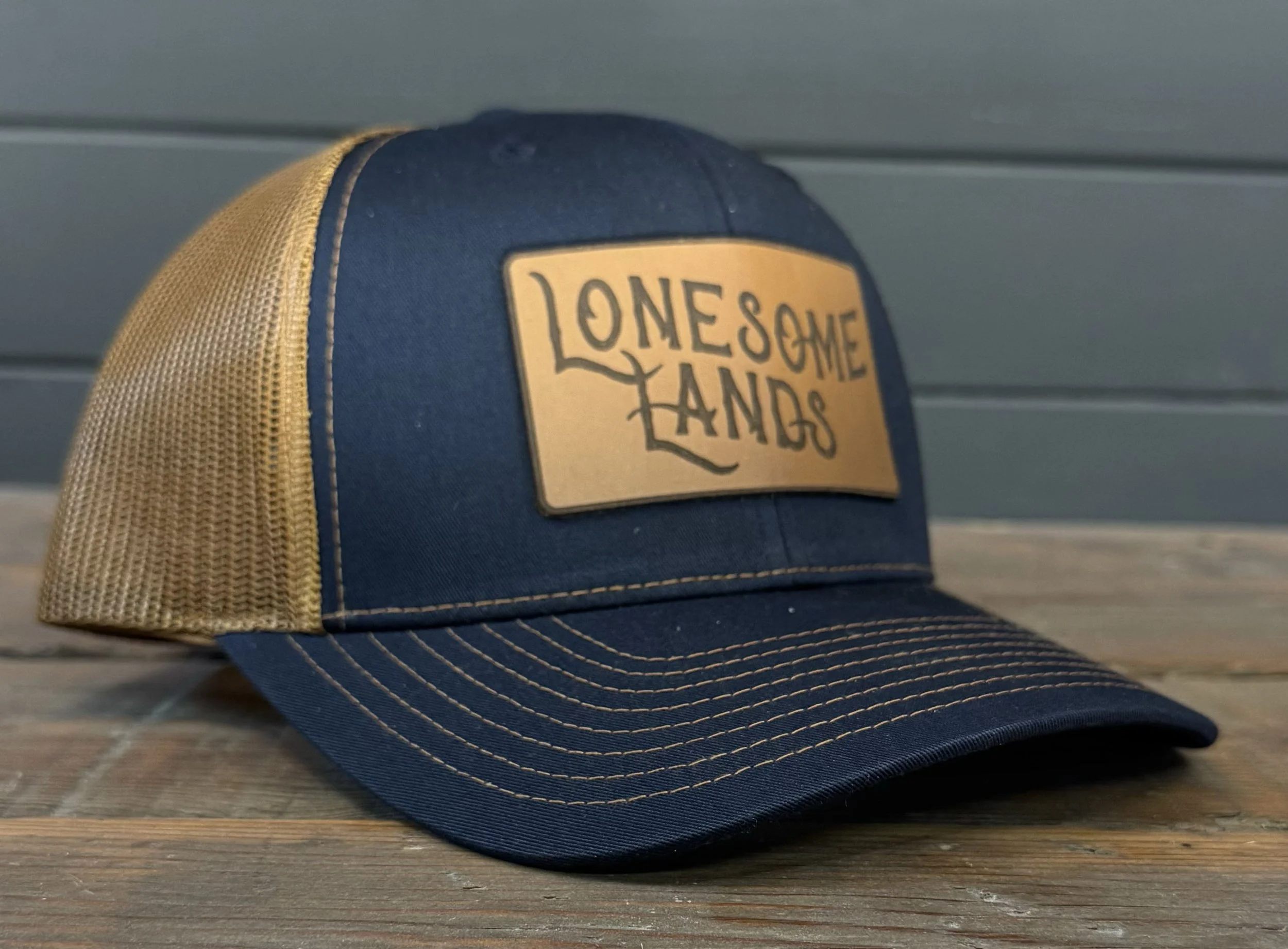 Lonesome Lands Navy Trucker Hat