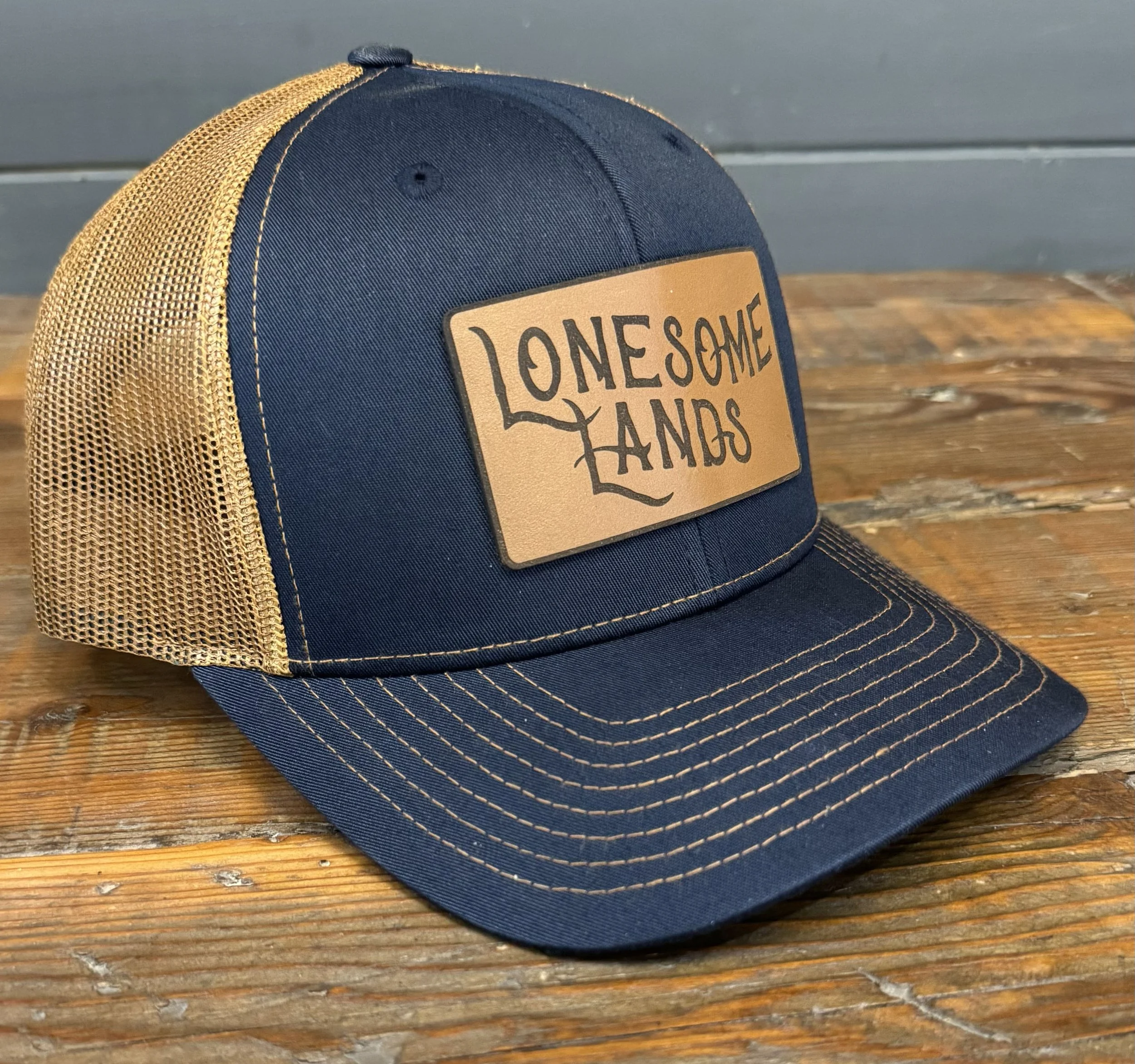 Lonesome Lands Navy Trucker Hat