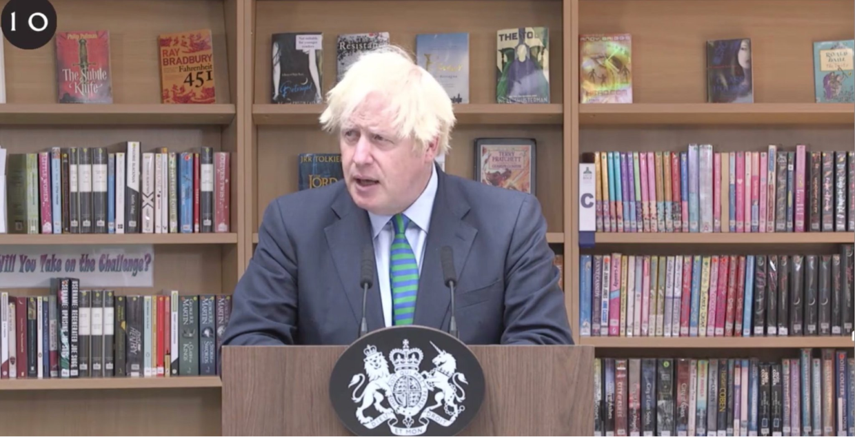 UK Prime Minister Boris Johnson hoping the bookcase will make him sound better.