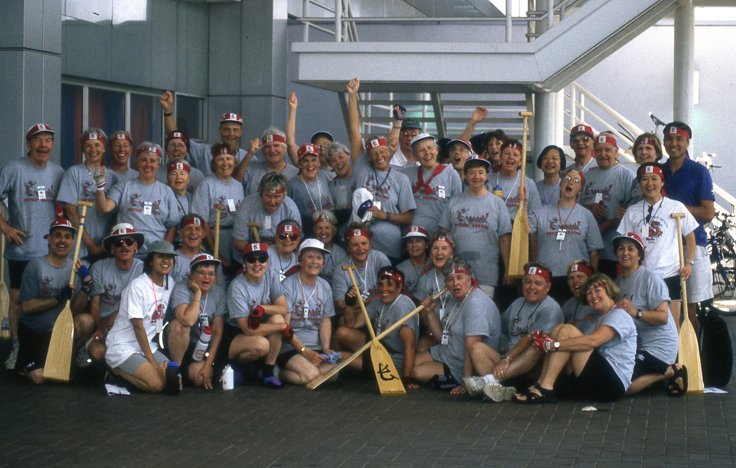 Nothin' Dragon team photo (2000) vintage racing shirts and wooden paddles (no sign of carbon fibre paddles yet). Can you spot Dan, Pat and Ann? 