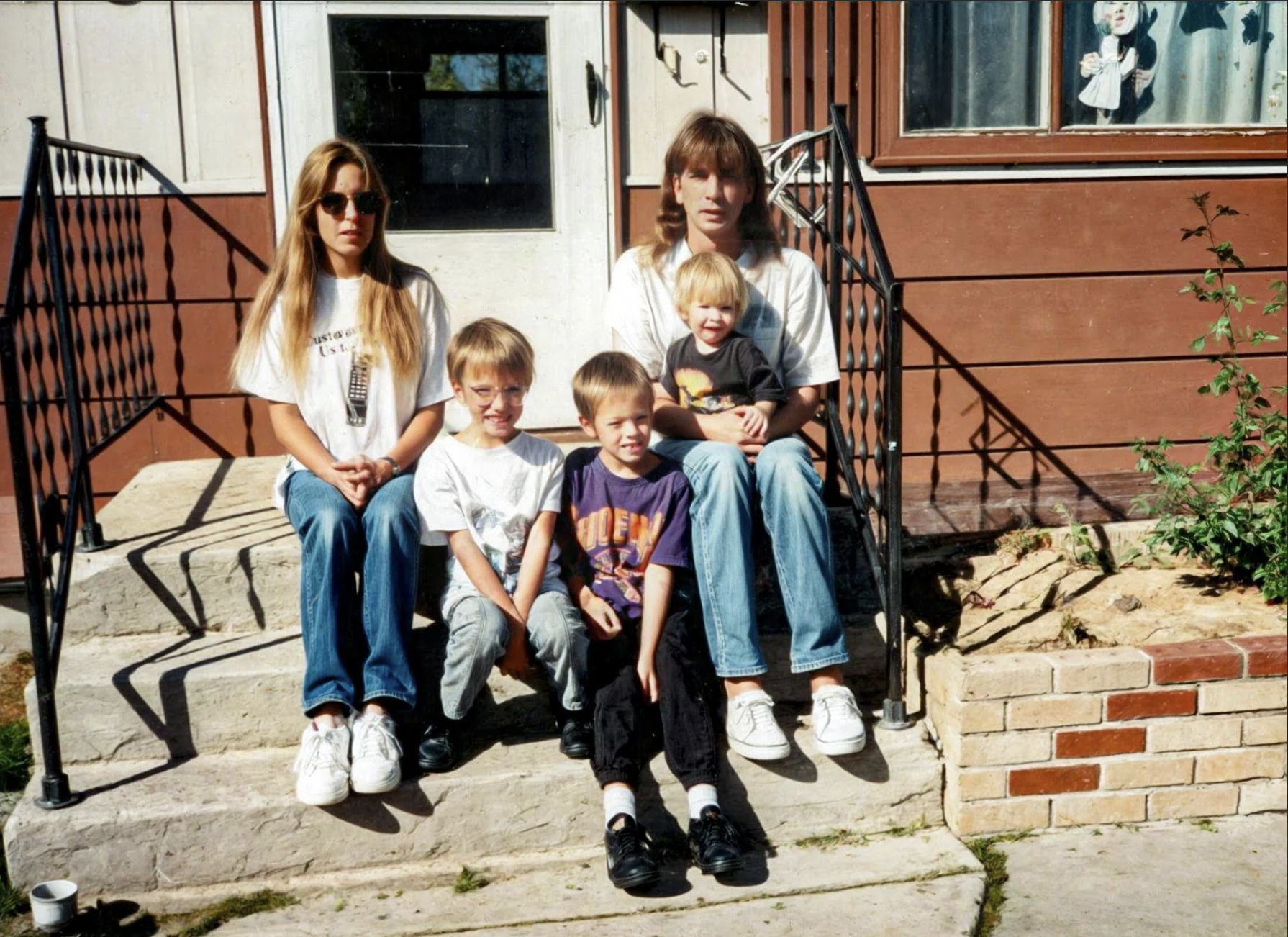 One of the few pictures of us all together. Mom, Johnathan, Josh, Dad, and I outside of 240 Walnut.