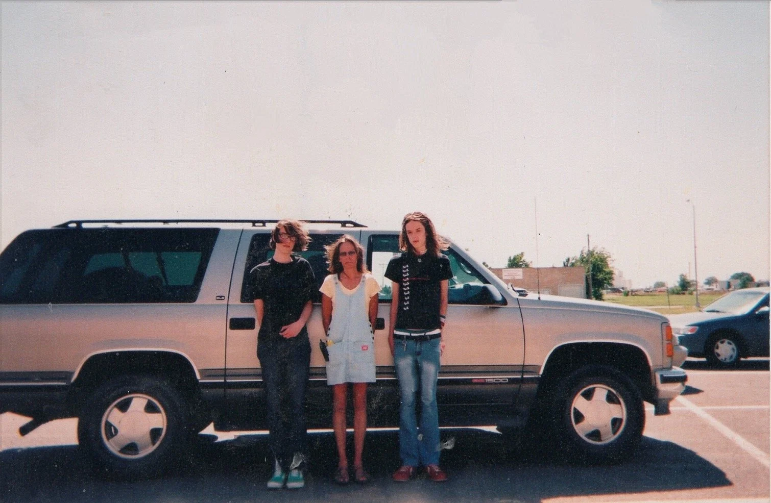 From 'Chapter Nine: The Return', Johnathan, Mom, and Josh during their brief return to Goodland. June 2003. 