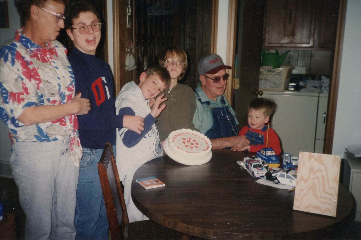 Grandma, Grandpa, Nathan, Josh, Johnathan, and I at 240 Walnut somewhere around 1996. 
