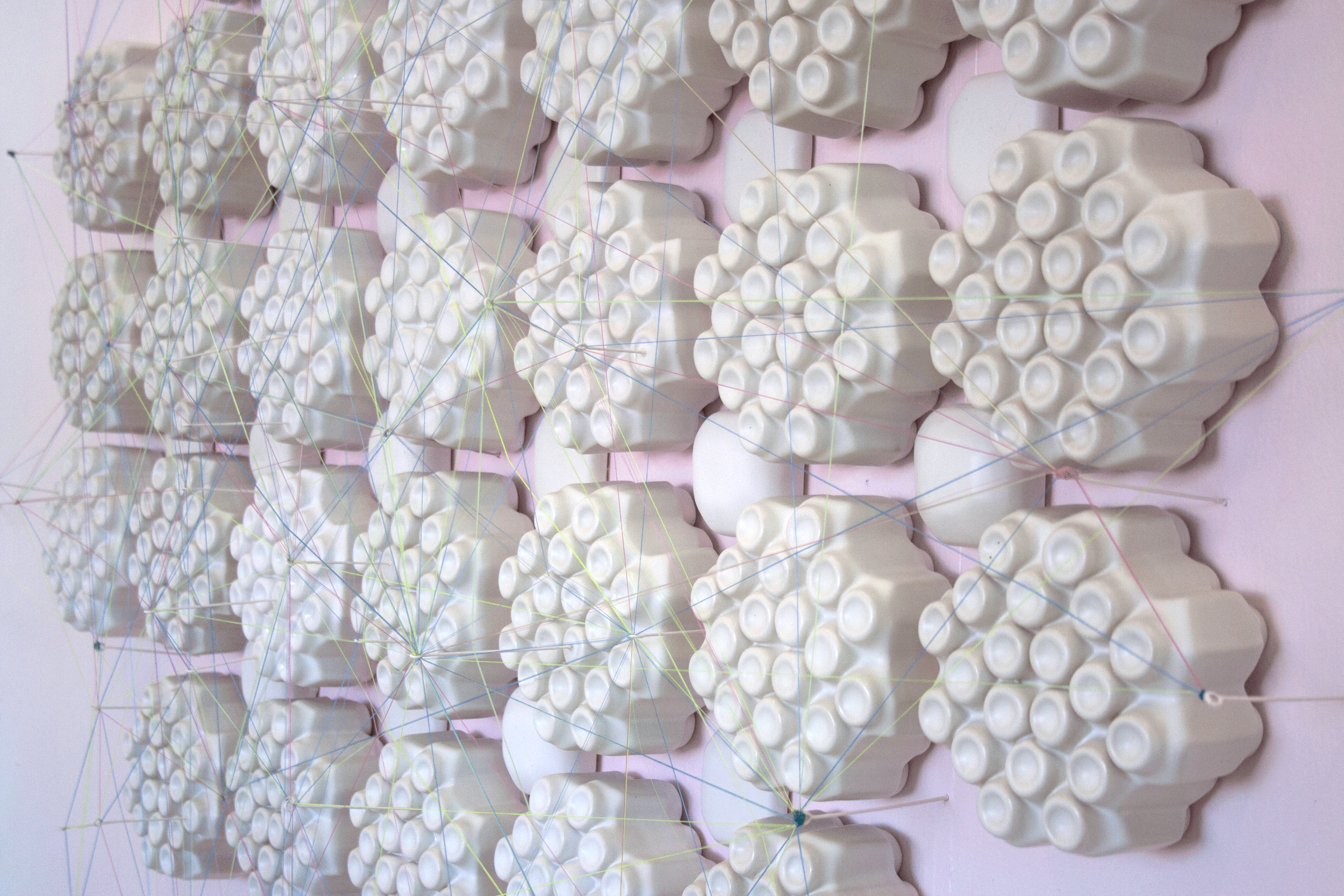 Linear Order. Glazed ceramic, monofilament, steel. 96''x96''x10''. 2018