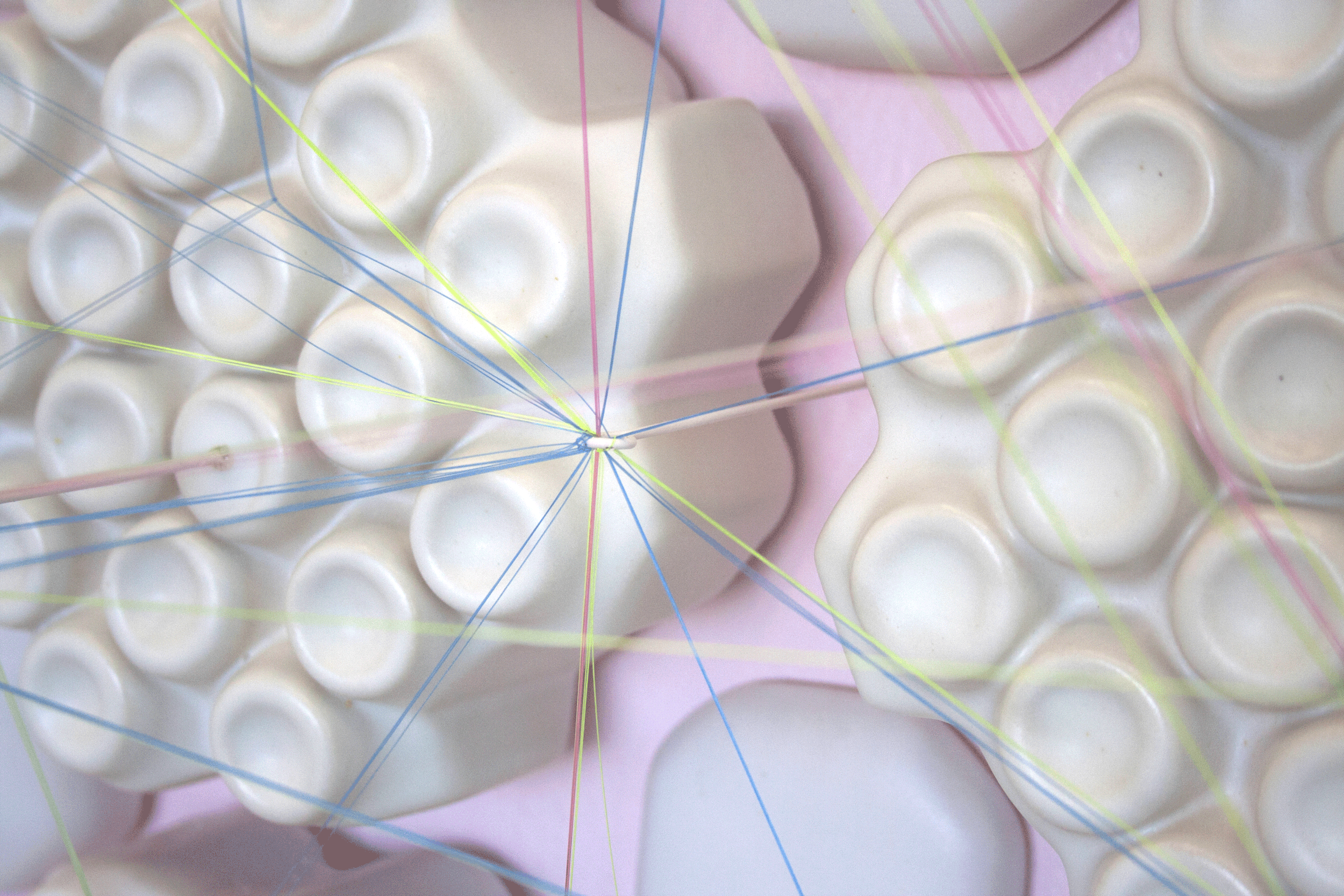 Linear Order. Glazed ceramic, monofilament, steel. 96''x96''x10''. 2018