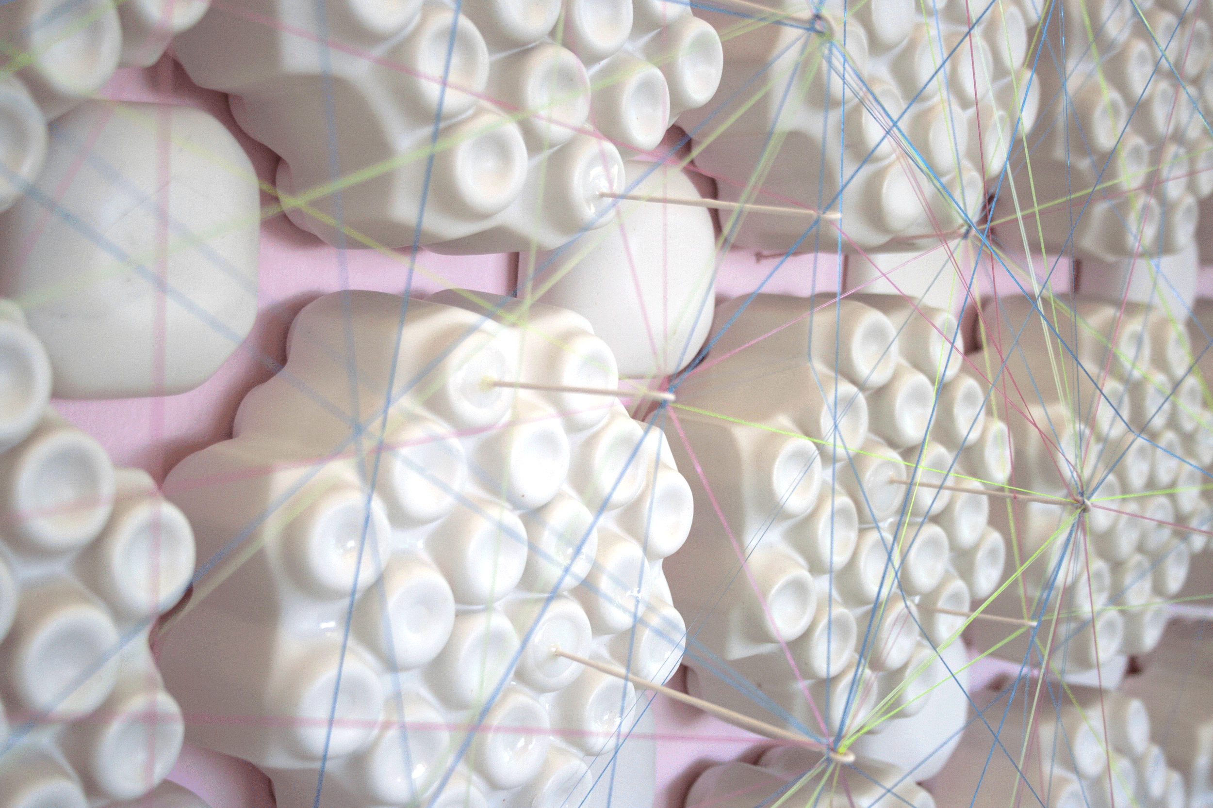Linear Order. Glazed ceramic, monofilament, steel. 96''x96''x10''. 2018