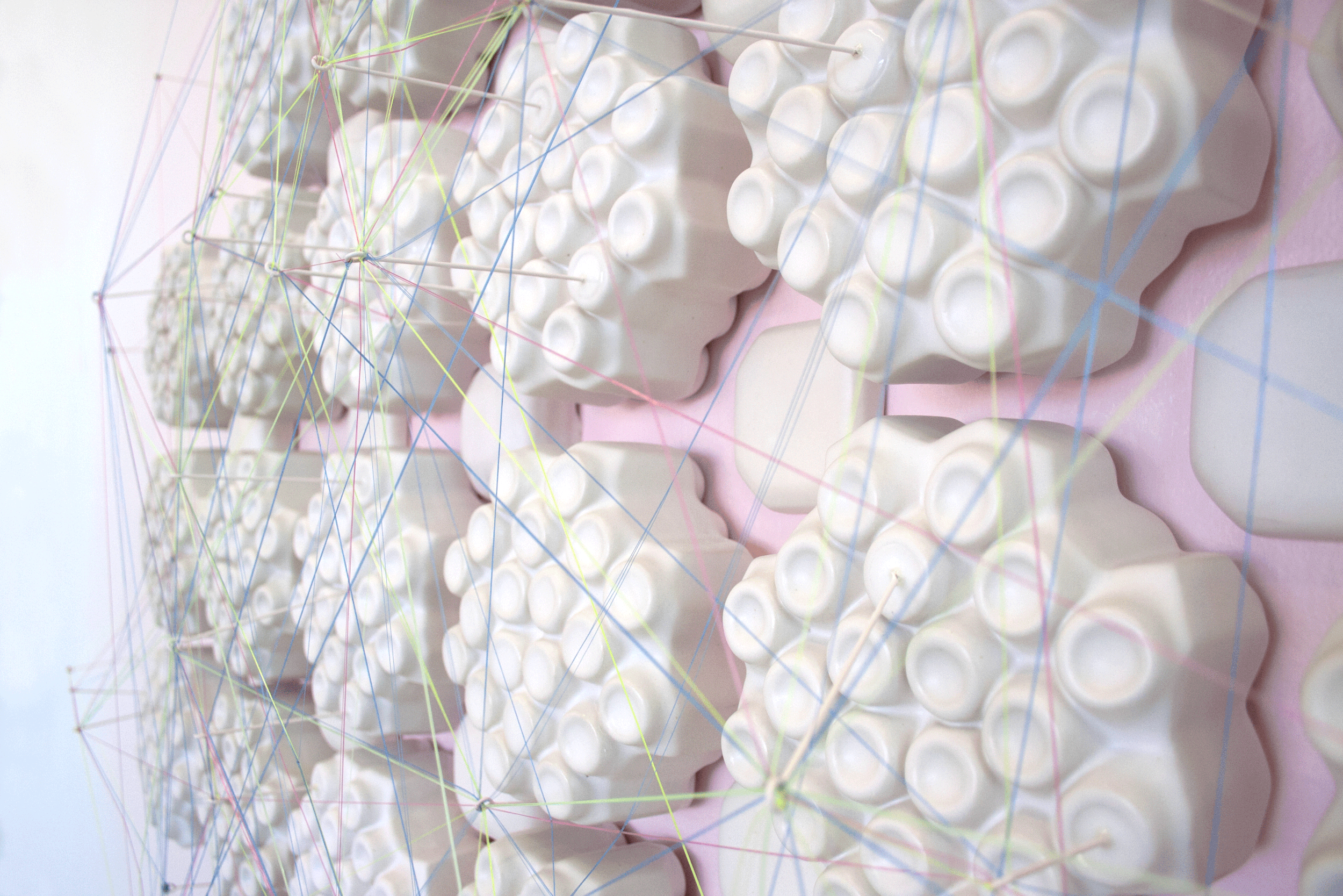 Linear Order. Glazed ceramic, monofilament, steel. 96''x96''x10''. 2018