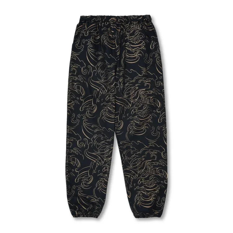 Black Kimono pants with gold swirling abstract pattern and elastic waistband and cuffs. " Gakunami Wave "