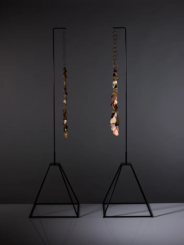 veness_necklaces_on_stands.jpg
